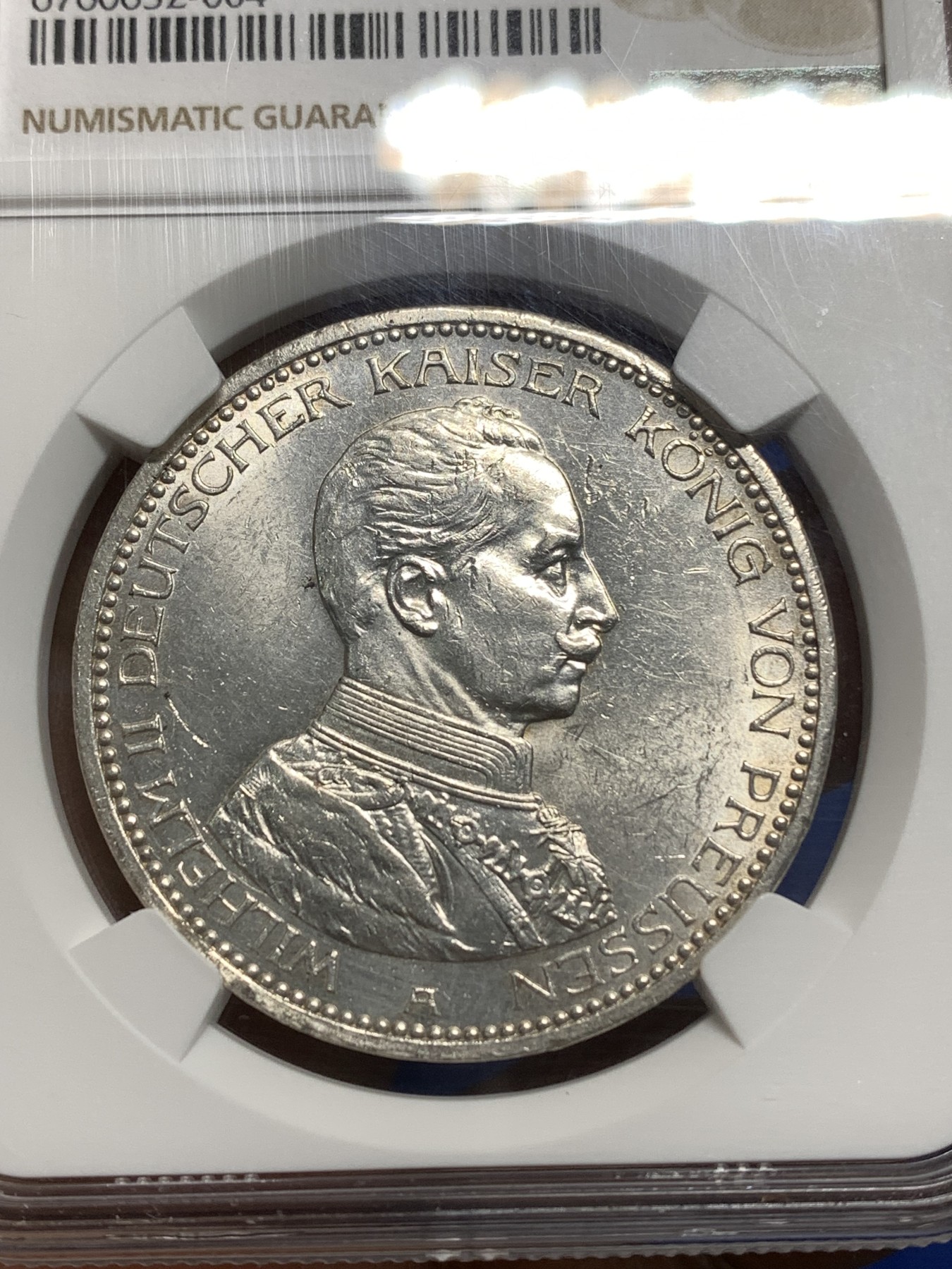 《竞宝斋》第221场-周日，周一 2场 (全场包邮) NGC-AU58 德国1913年普鲁士王国威廉二世戎装像5马克纪念银币，状态极佳，低评，状态和品质不输MS级品质，获得更高的评分数目才区区227枚。