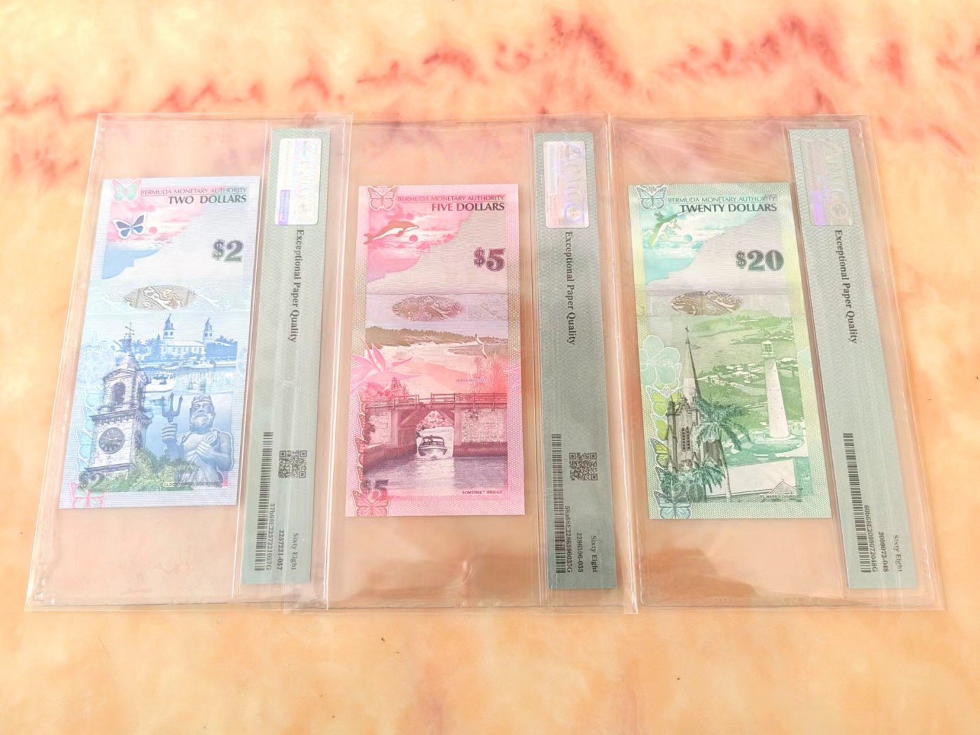 全新 PMG68E 2009年 百慕大2元 5元 20元 。获奖纸币 高分难得。  评级币以分数为准，售出不退不换