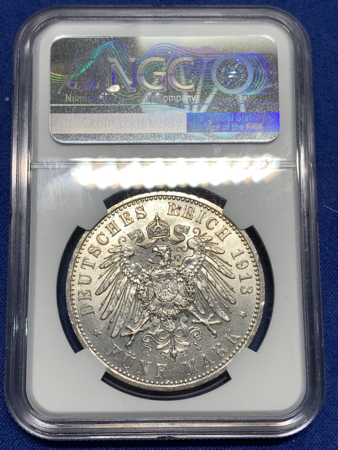 《竞宝斋》第221场-周日，周一 2场 (全场包邮) NGC-AU58 德国1913年普鲁士王国威廉二世戎装像5马克纪念银币，状态极佳，低评，状态和品质不输MS级品质，获得更高的评分数目才区区227枚。