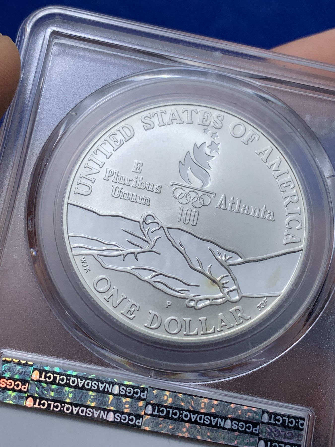 《竞宝斋》第221场-周日，周一 2场 (全场包邮) PCGS-PR69 美国1995年残奥会1美元精制纪念银币 ，PROOF全新镜面状态精制币，状态极佳，更高评级数量才25枚。