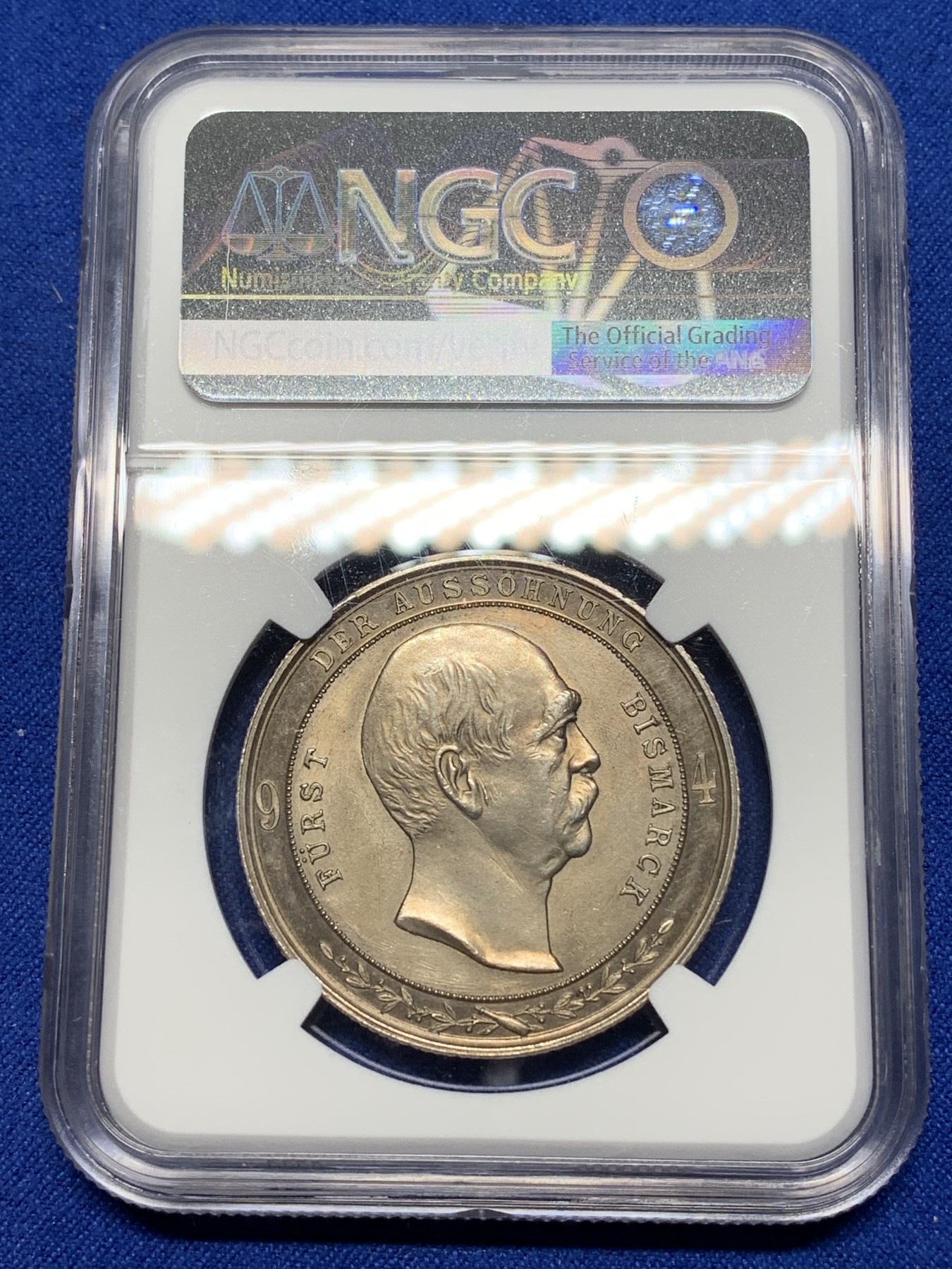 《竞宝斋》第221场-周日，周一 2场 (全场包邮) NGC-MS63 德国 1894年 威廉二世与俾斯曼和解银章 呈现Proof环形镜面 金色包浆 很经典的品种