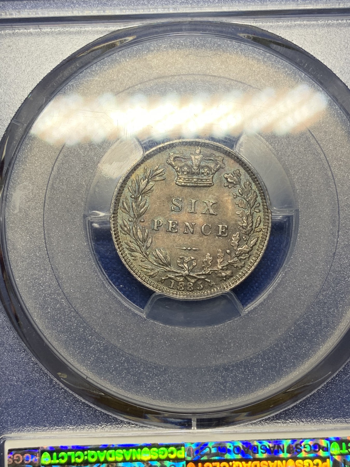 《竞宝斋》第221场-周日，周一 2场 (全场包邮) PCGS MS63 英国1885维多利亚女王6便士银币  顶级紫罗兰五彩 略有低评