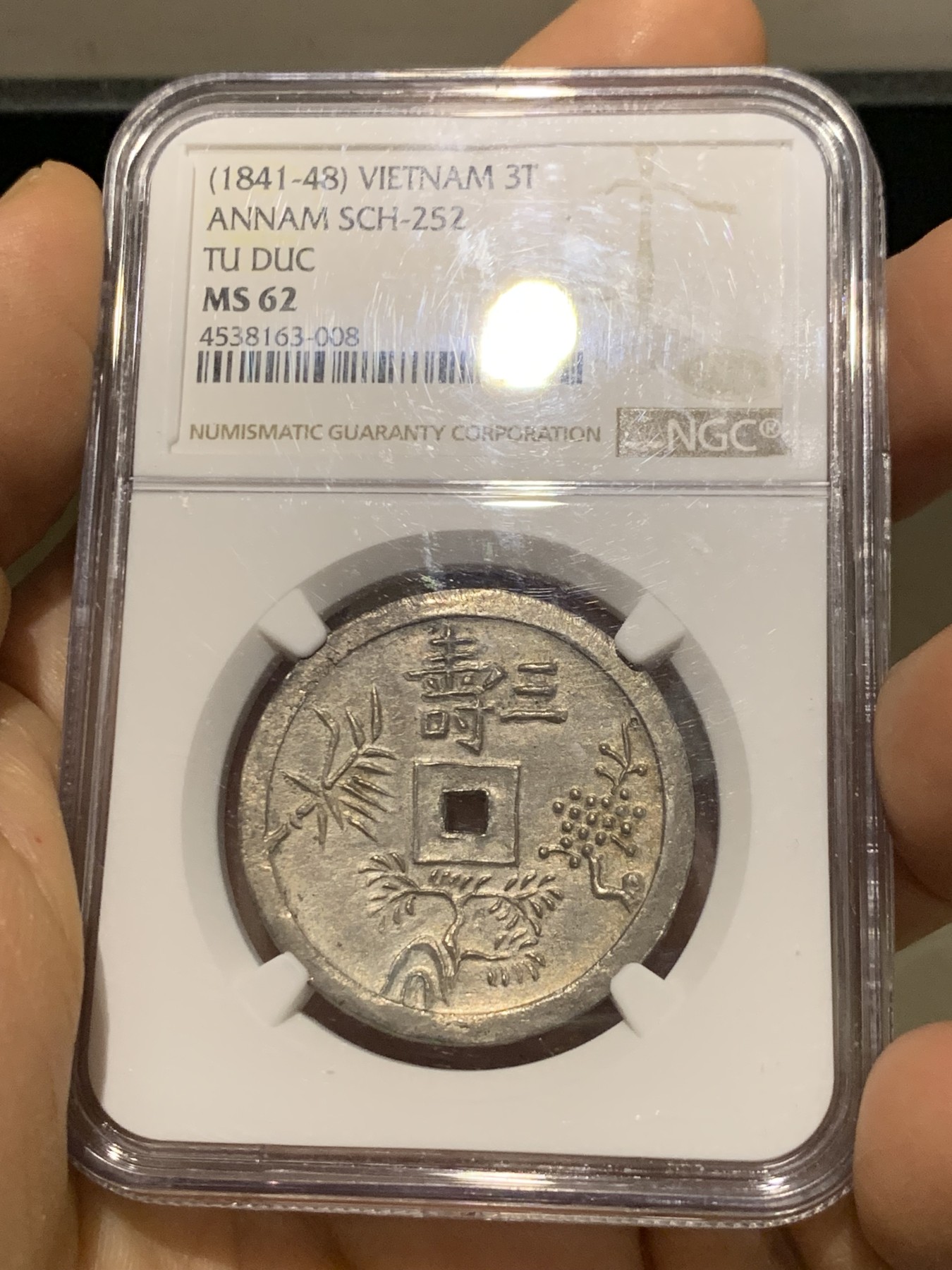 《竞宝斋》第221场-周日，周一 2场 (全场包邮) NGC MS62 越南1841-48 安南绍治松竹梅三寿三钱银币 透打原味 22年同分白币八万多成交