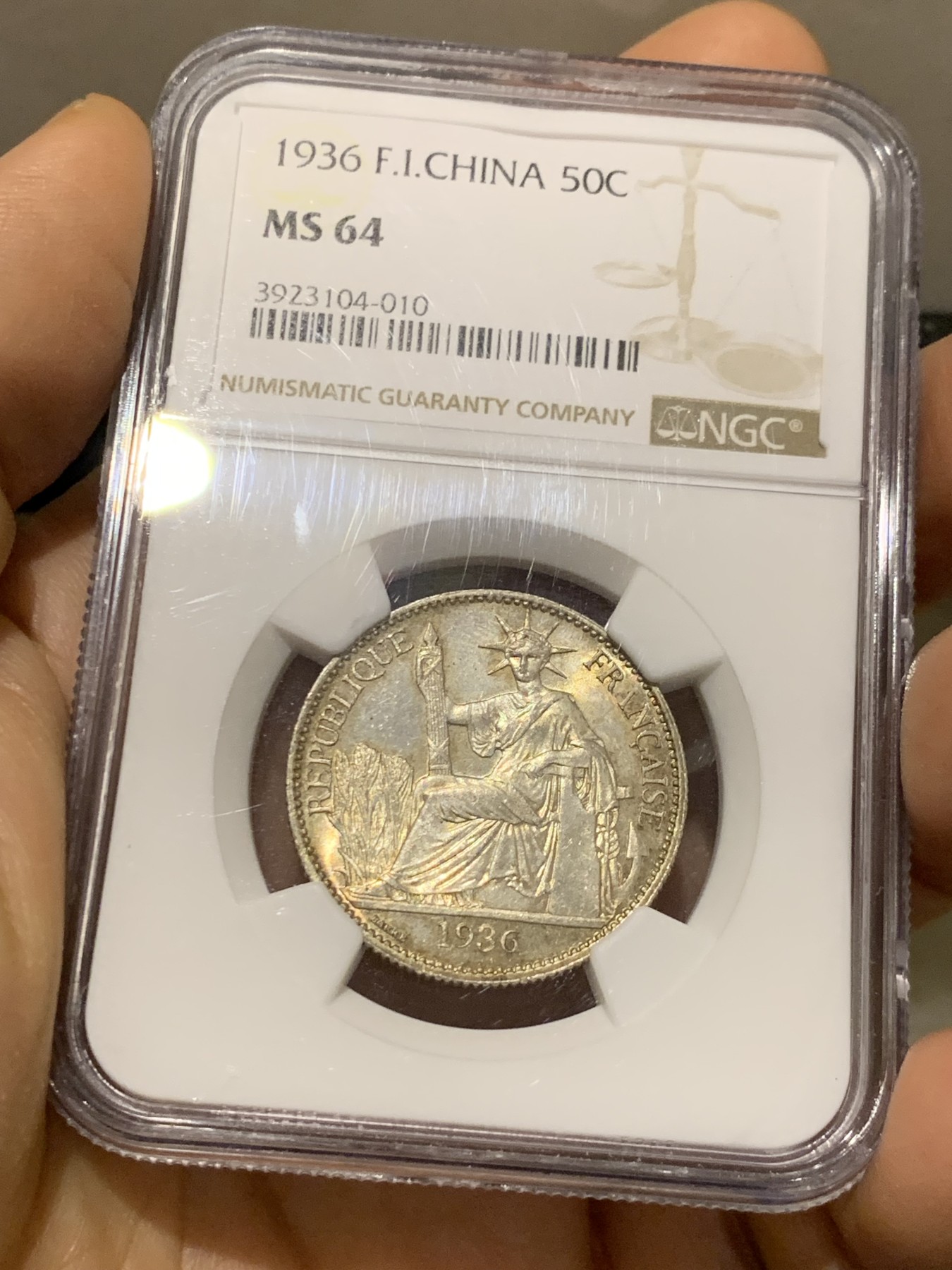 《竞宝斋》第221场-周日，周一 2场 (全场包邮) NGC MS64 1936年法属印支坐洋50分银币 极品原光五彩 状态一流 低评状态