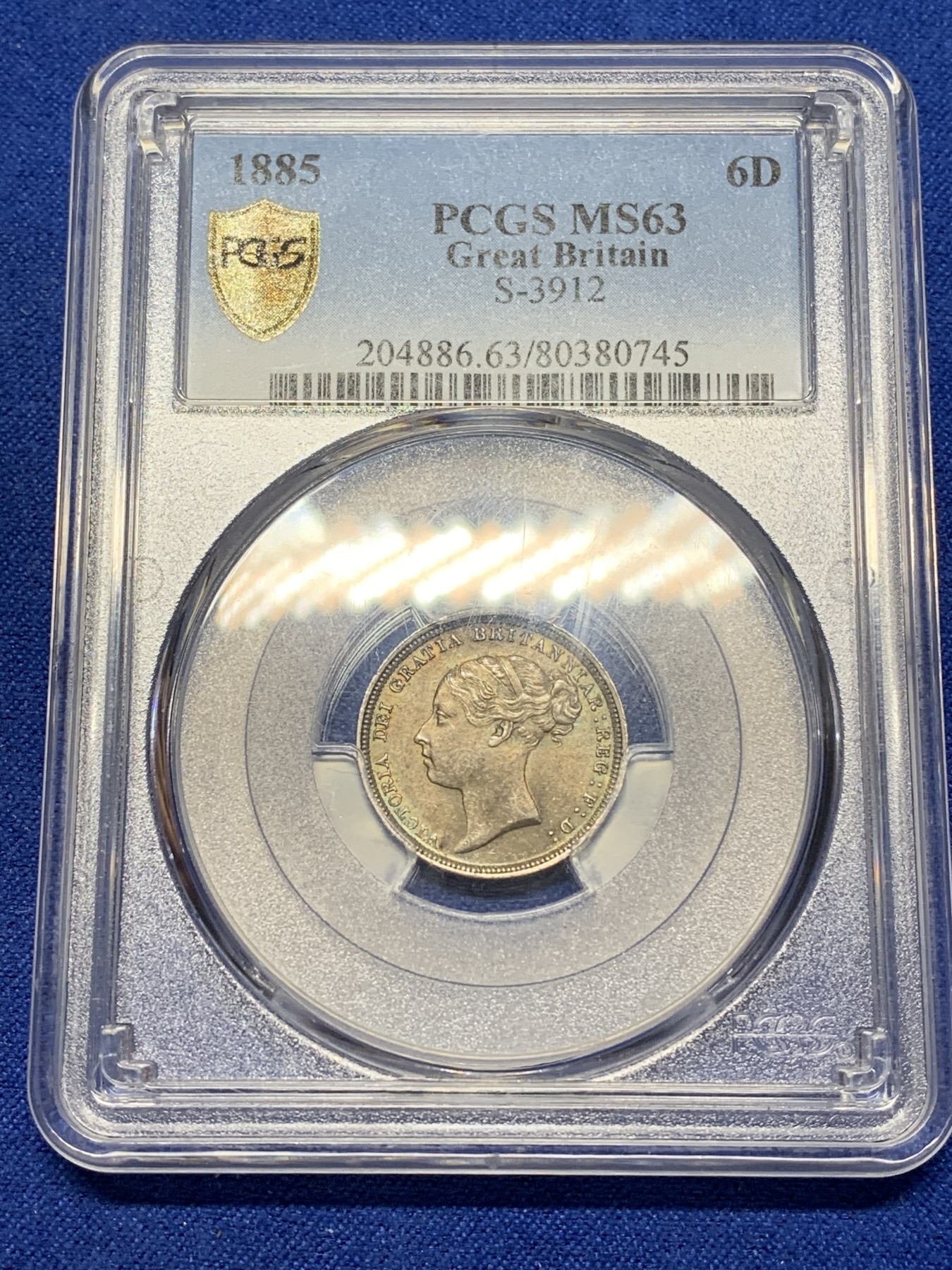 《竞宝斋》第221场-周日，周一 2场 (全场包邮) PCGS MS63 英国1885维多利亚女王6便士银币  顶级紫罗兰五彩 略有低评