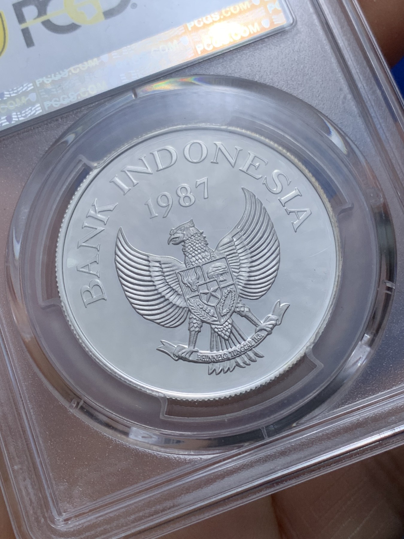 《竞宝斋》第221场-周日，周一 2场 (全场包邮) PCGS金盾 PR68DCAM 印度尼西亚1987年鹿豚1万卢比精制银币