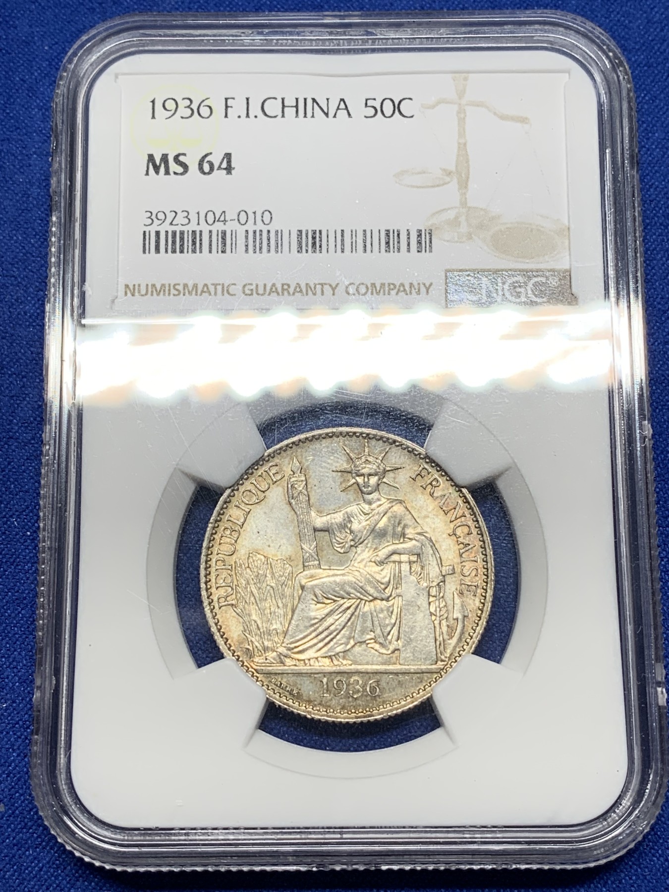 《竞宝斋》第221场-周日，周一 2场 (全场包邮) NGC MS64 1936年法属印支坐洋50分银币 极品原光五彩 状态一流 低评状态