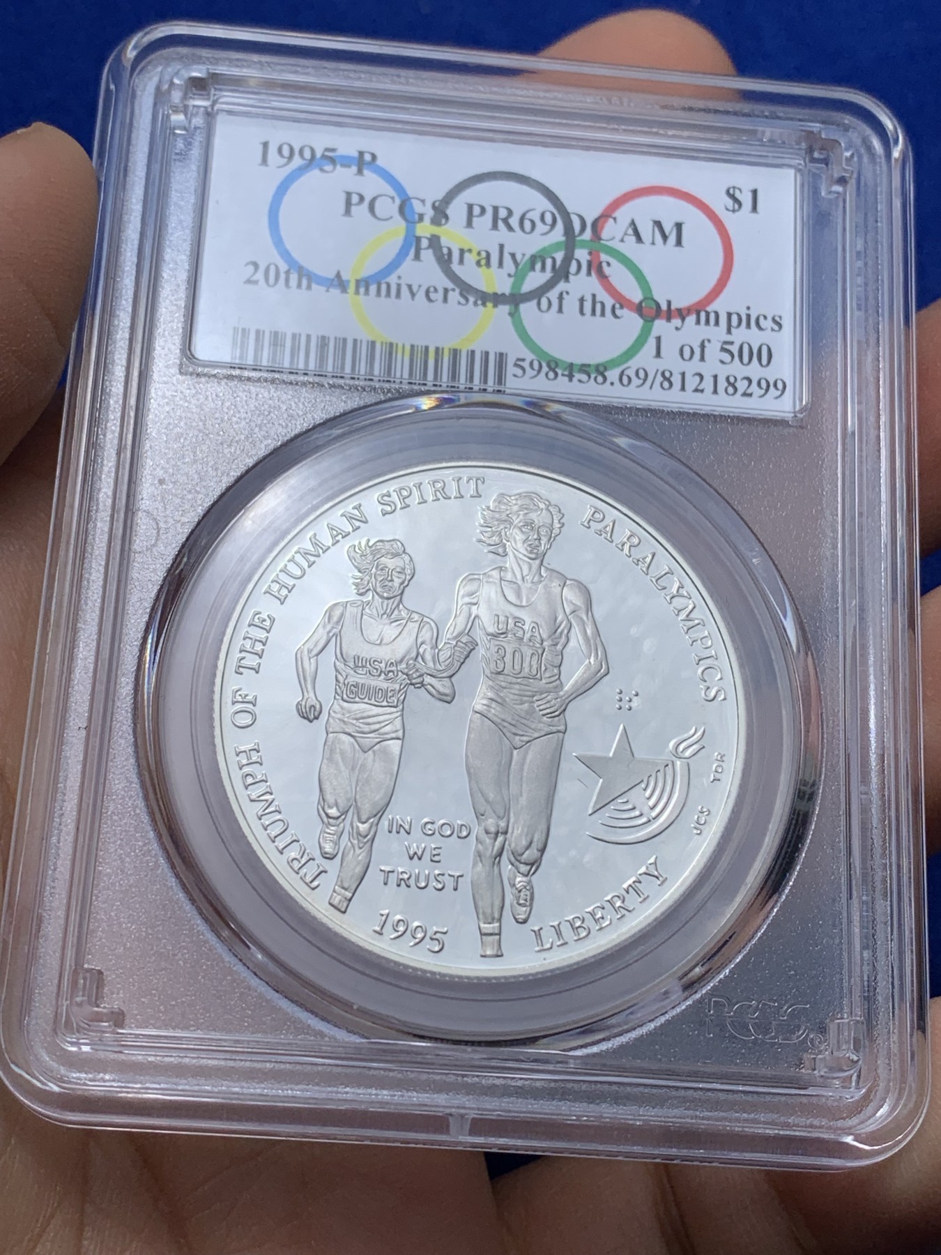 《竞宝斋》第221场-周日，周一 2场 (全场包邮) PCGS-PR69 美国1995年残奥会1美元精制纪念银币 ，PROOF全新镜面状态精制币，状态极佳，更高评级数量才25枚。