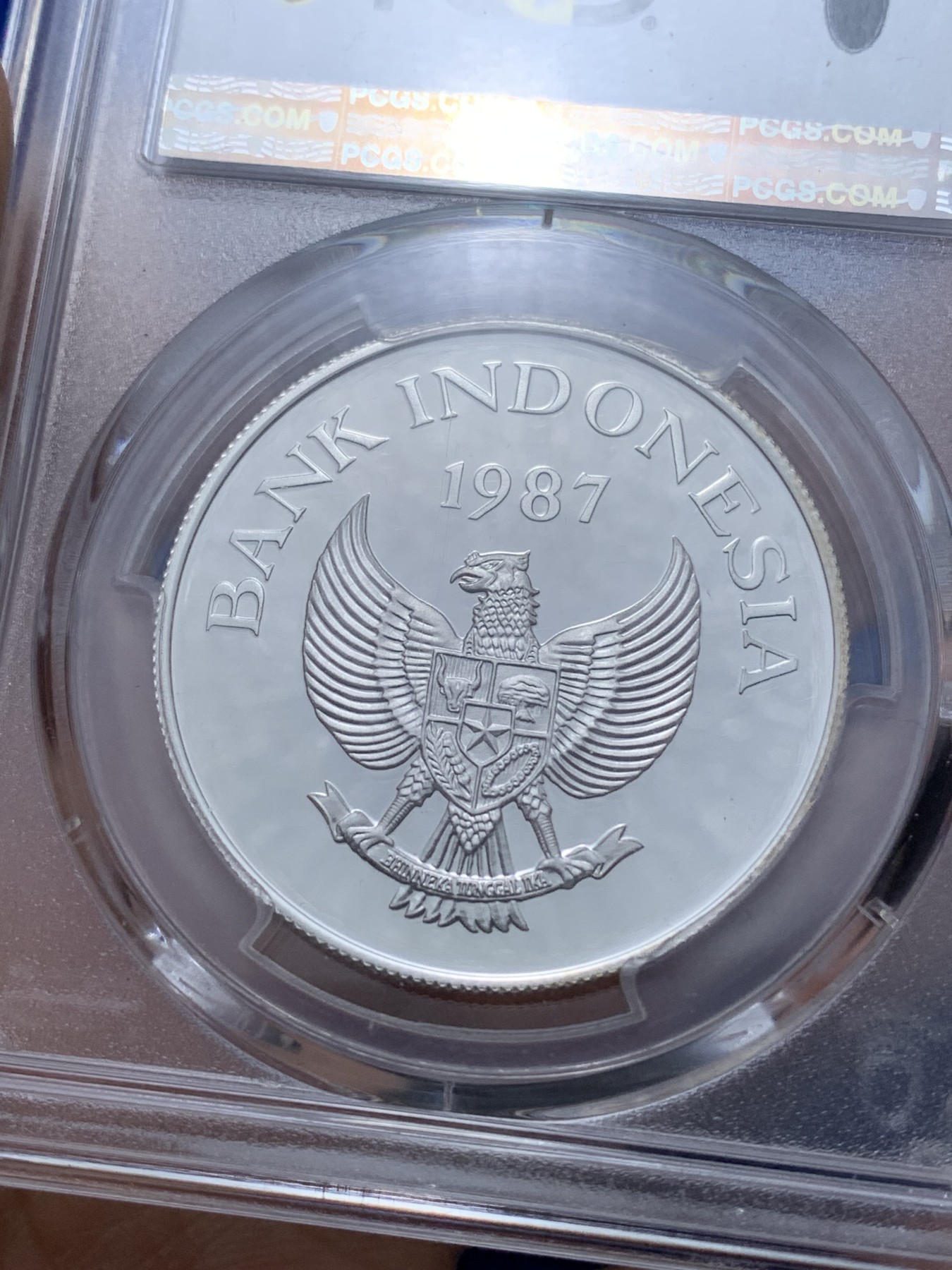 《竞宝斋》第221场-周日，周一 2场 (全场包邮) PCGS金盾 PR68DCAM 印度尼西亚1987年鹿豚1万卢比精制银币