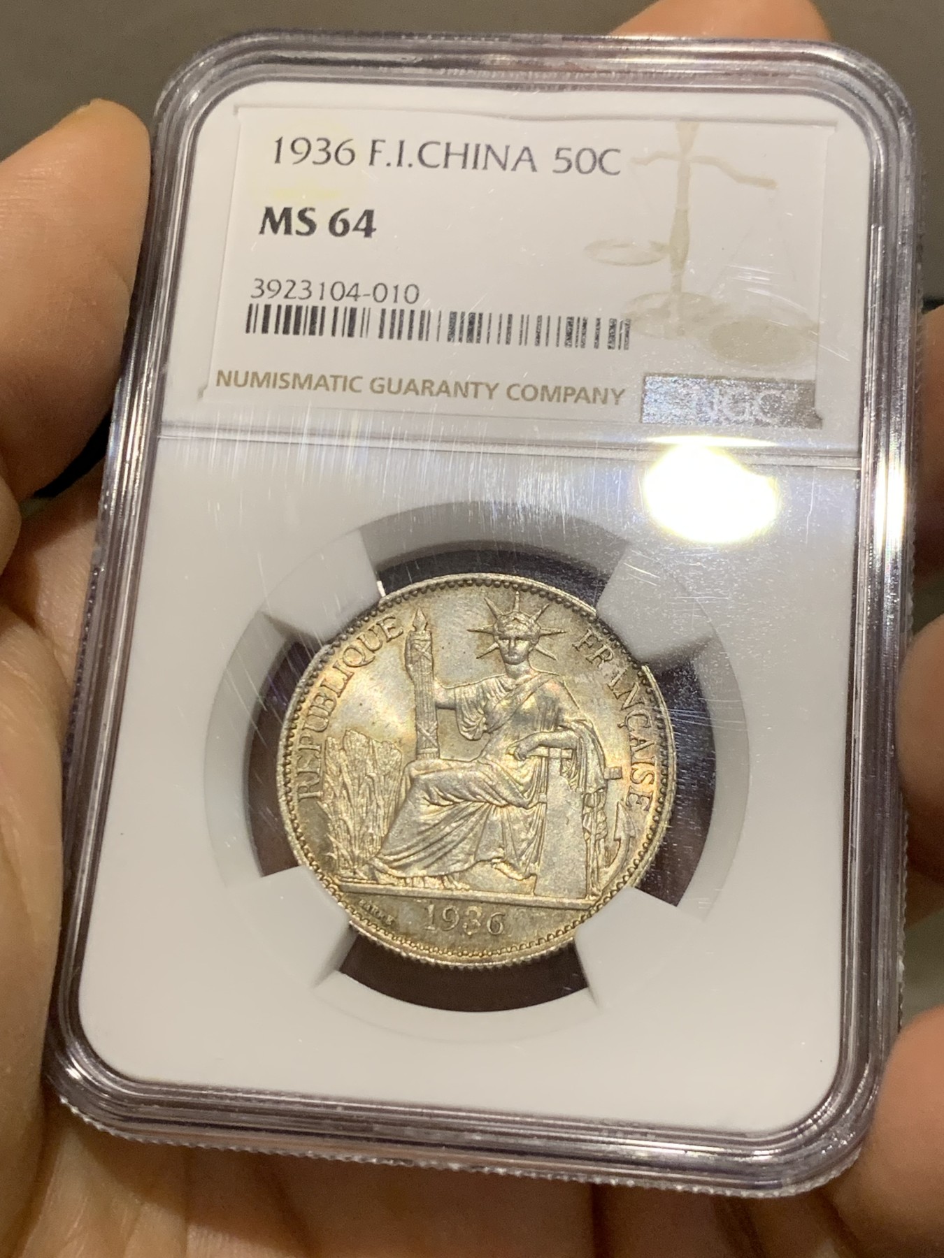 《竞宝斋》第221场-周日，周一 2场 (全场包邮) NGC MS64 1936年法属印支坐洋50分银币 极品原光五彩 状态一流 低评状态