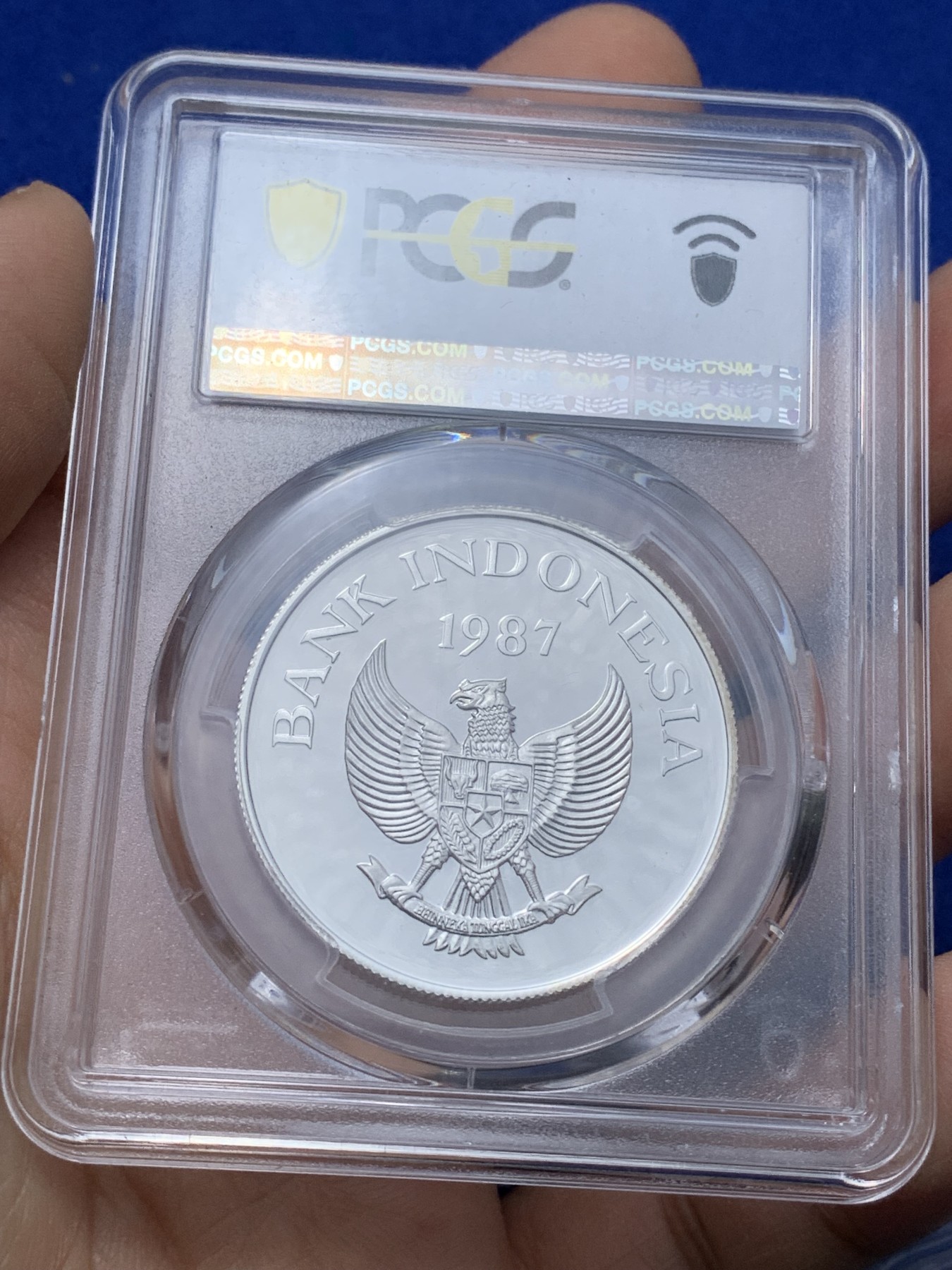 《竞宝斋》第221场-周日，周一 2场 (全场包邮) PCGS金盾 PR68DCAM 印度尼西亚1987年鹿豚1万卢比精制银币
