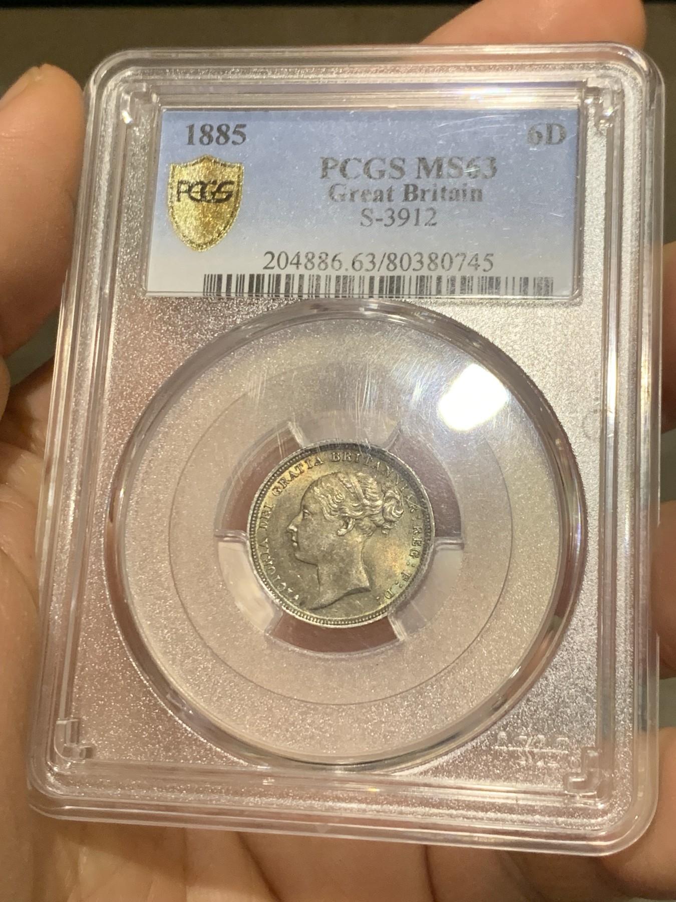 《竞宝斋》第221场-周日，周一 2场 (全场包邮) PCGS MS63 英国1885维多利亚女王6便士银币  顶级紫罗兰五彩 略有低评