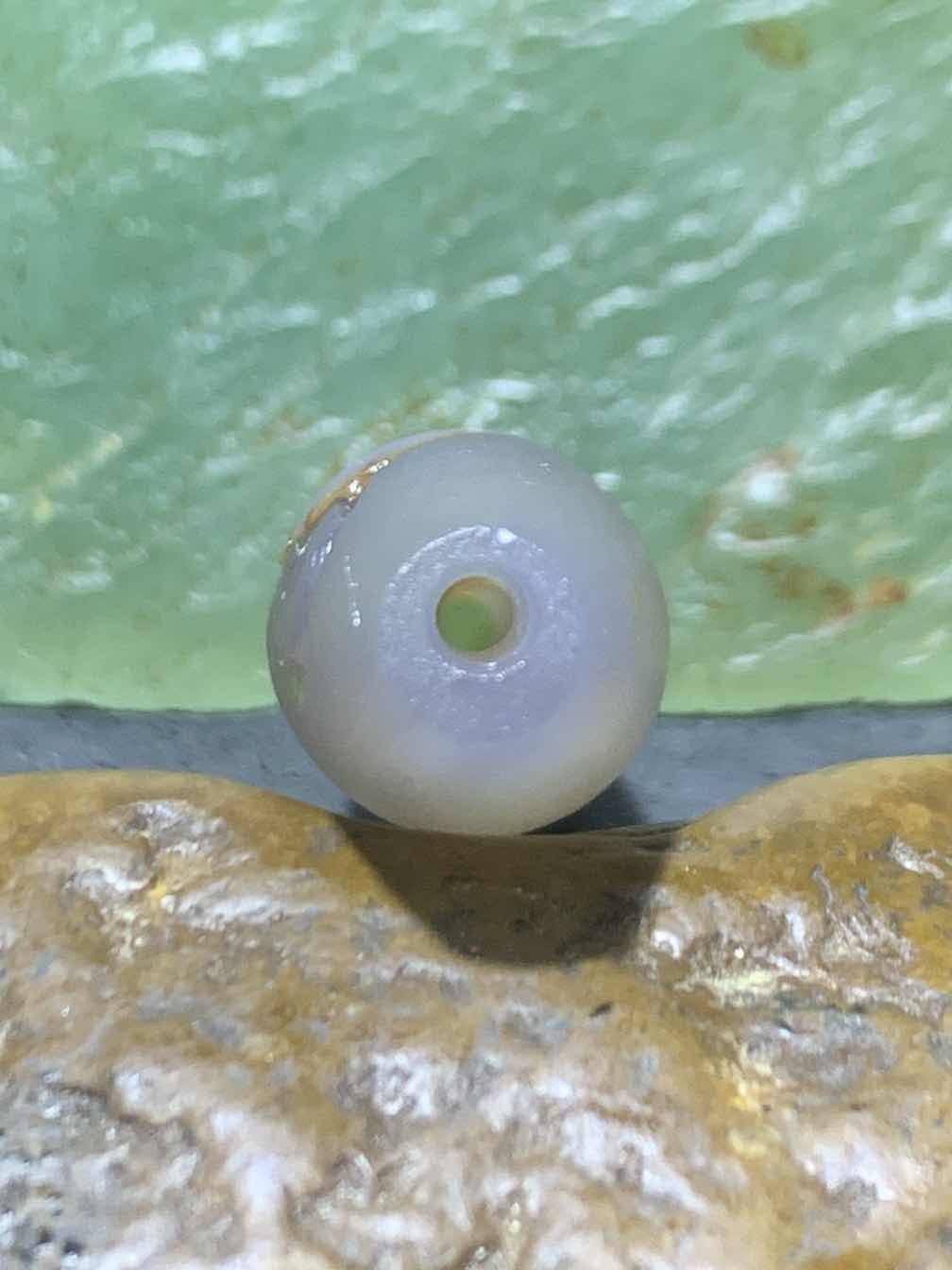 精美亚光高玉化巴西玛瑙手工俏色巧雕无相佛桶珠一个！