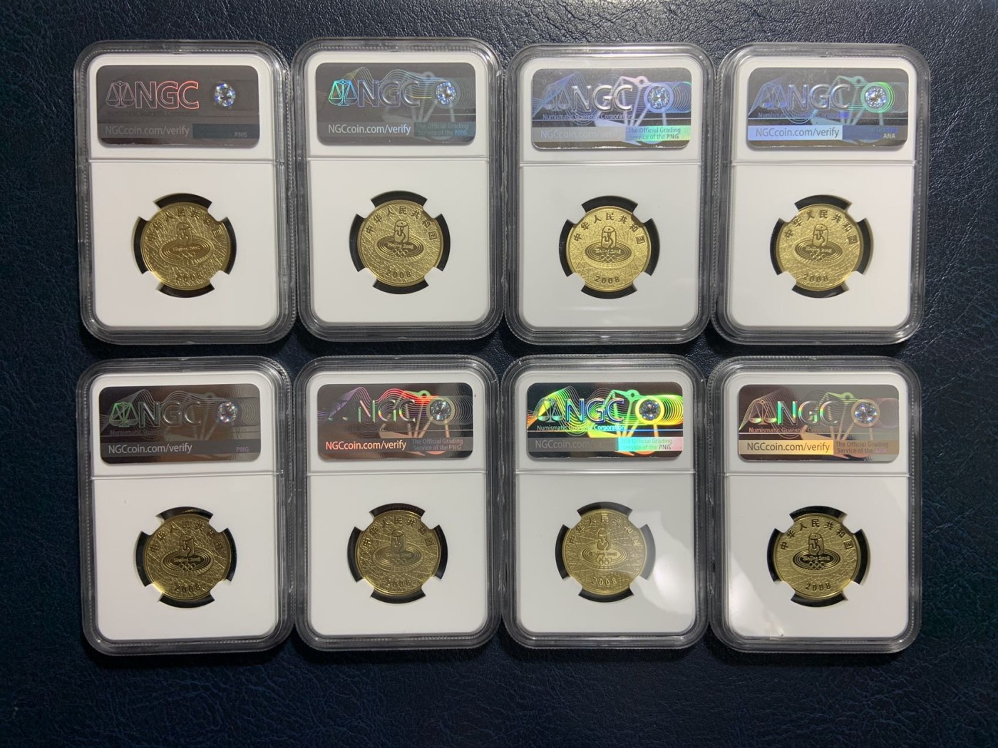 收藏联盟Quantum Auction 第309期拍卖  北京2008年第29届奥运会1元精制纪念币一套8枚 NGC Pf68 带原盒和证书
