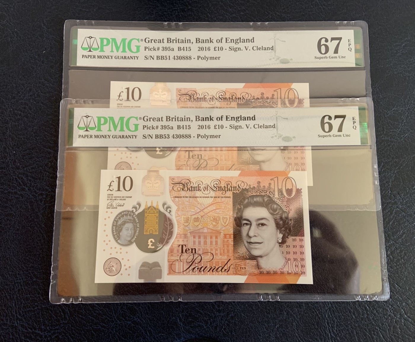 收藏联盟Quantum Auction 第309期拍卖  英国2016年10镑全同号一对 PMG67 豹子号888