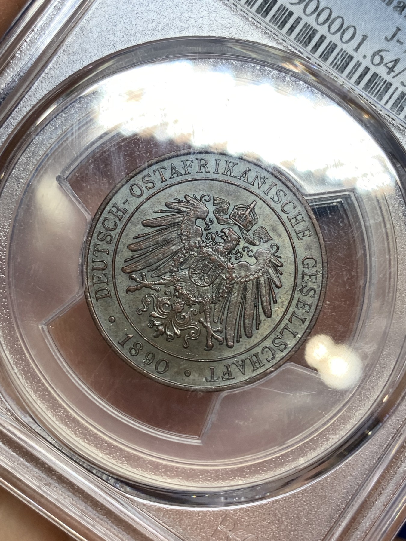 《竞宝斋》第222场-周日，周一 2场 (全场包邮) PCGS-MS64BN 德属东非1890年1派沙铜币，丝滑巧克力，极富地方特色的品种。64收藏级分数