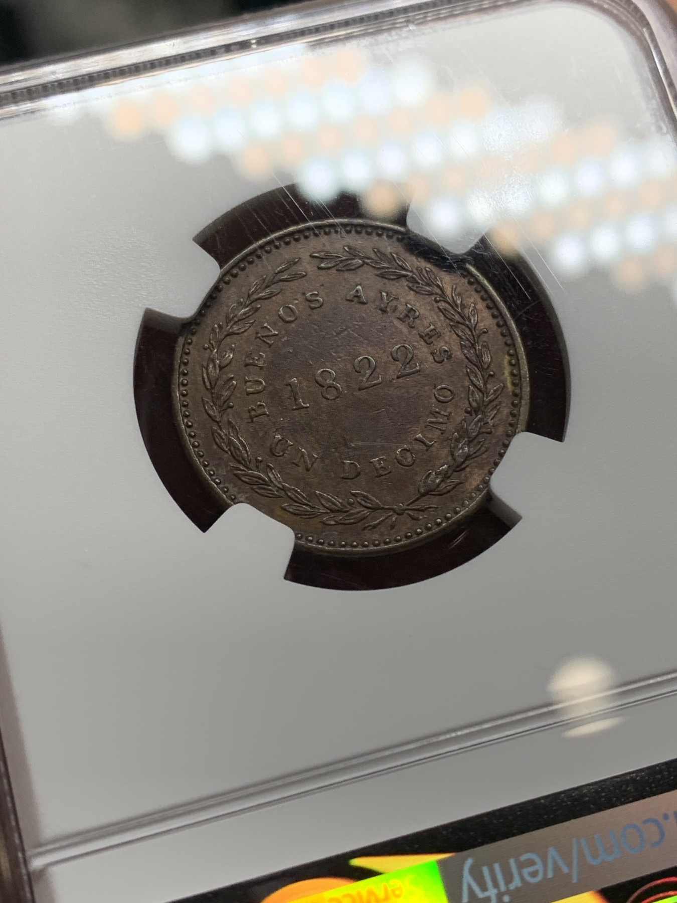 《竞宝斋》第222场-周日，周一 2场 (全场包邮) NGC-AU55BN 阿根廷1822年布宜诺斯艾利斯1D铜币，60分参考价160美元。早期阿根廷稀见