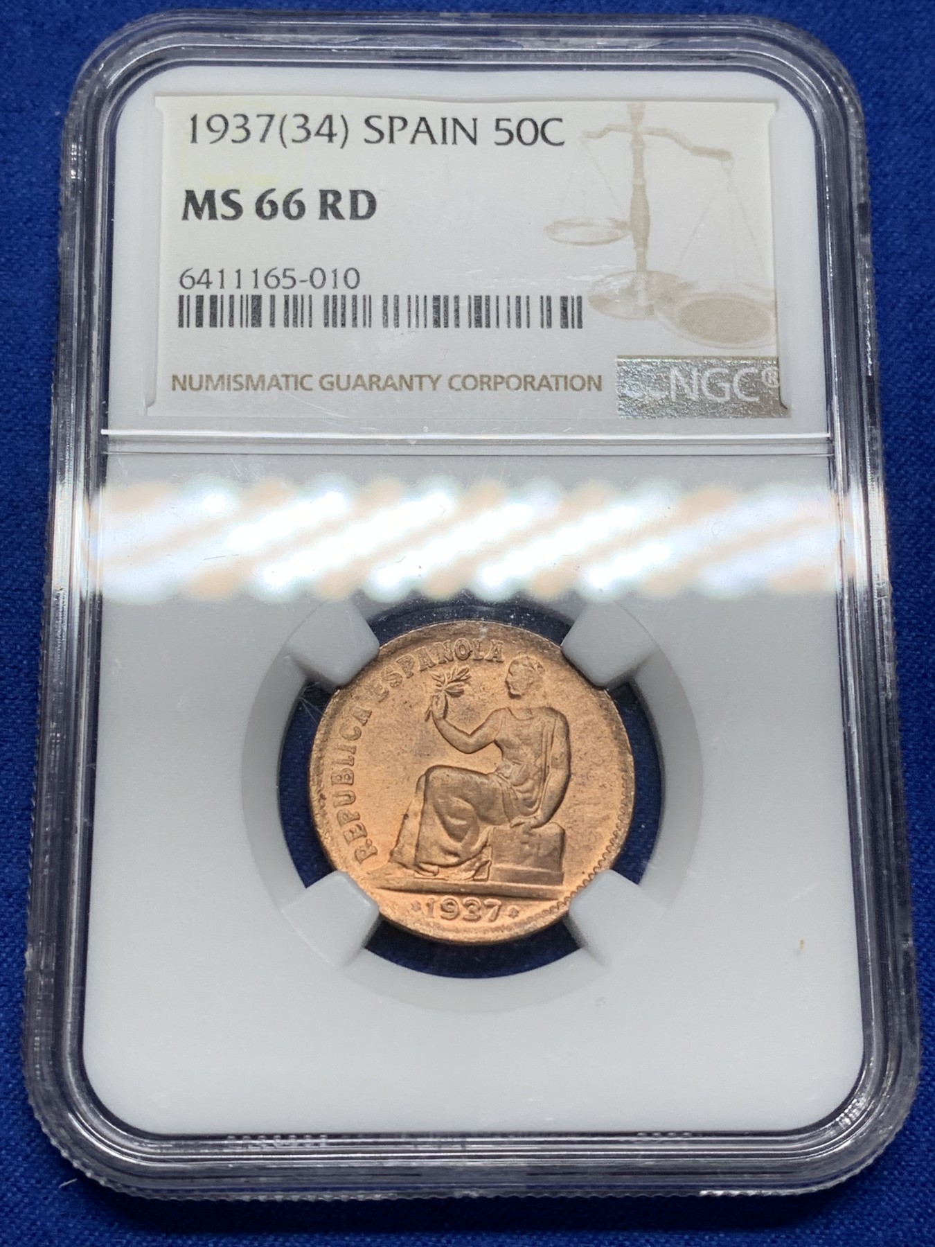 《竞宝斋》第222场-周日，周一 2场 (全场包邮) NGC-MS66RD 冠军分 西班牙1937年内战50分铜币，坐人女神。低估品种，仅发行2个年份，63分参考价50美元。RD红铜光靓丽，66冠军品质