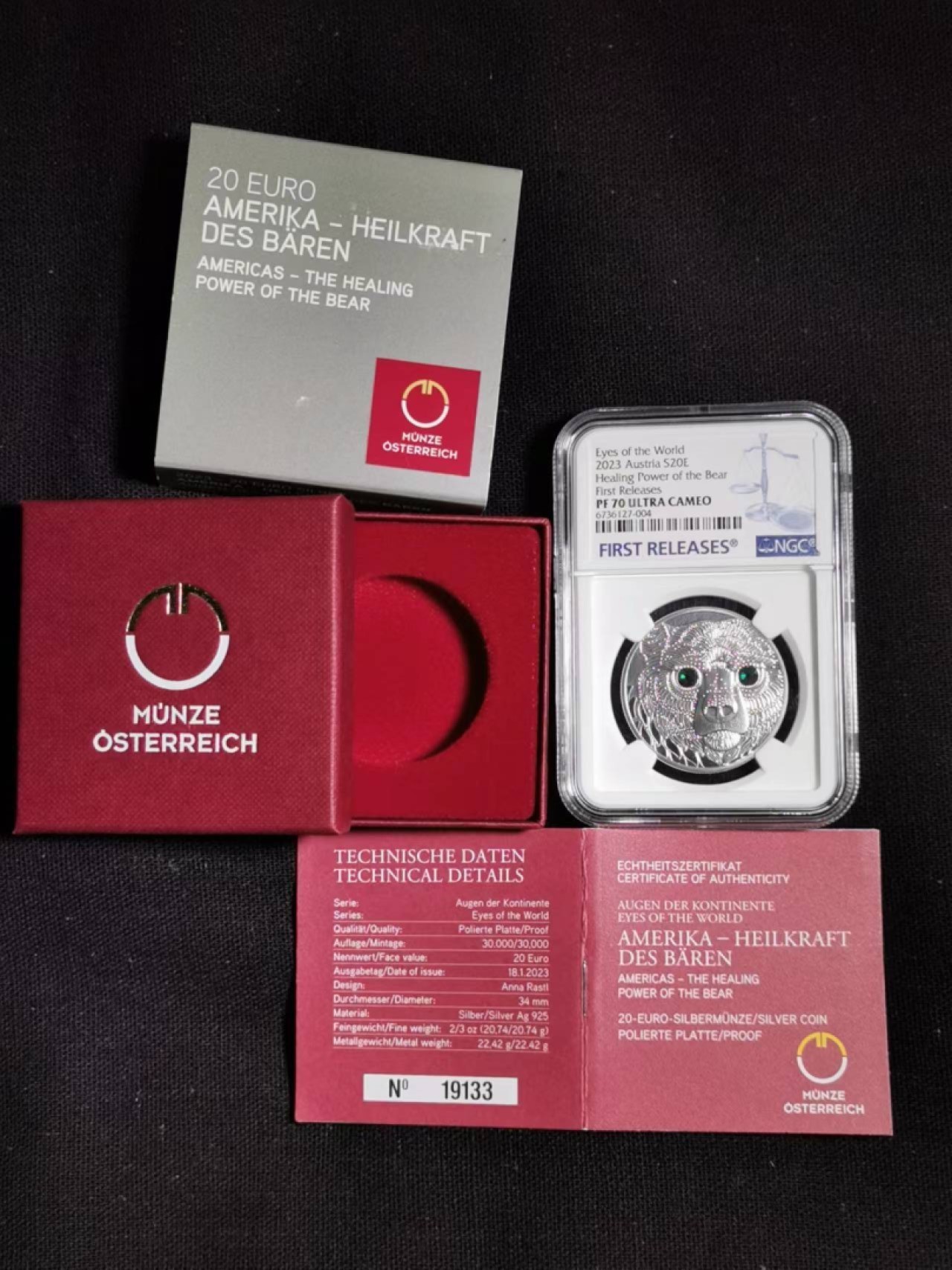 刘世昌艺术品销售中心～虎踞龙蟠*金杨在线联拍群第505期 奥地利2023年世界之眼～美洲熊20欧镶嵌水晶精制纪念银币（NGC PF70UC 串号：6736127-004）1枚，原盒证。
