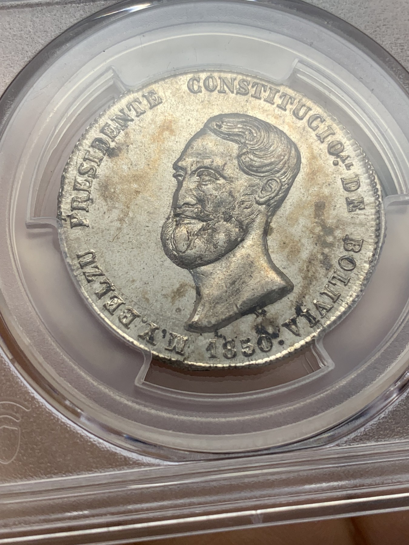 《竞宝斋》第223场-周日，周一 2场 (全场包邮) PCGS MS64 玻利维亚1850 共和国银质“宣言 无政府主义的胜利”4索尔面值银章  极少见品种。源自Robert C. Knepper名家旧藏  贝祖尔总统为玻利维亚著名的民粹主义总统。