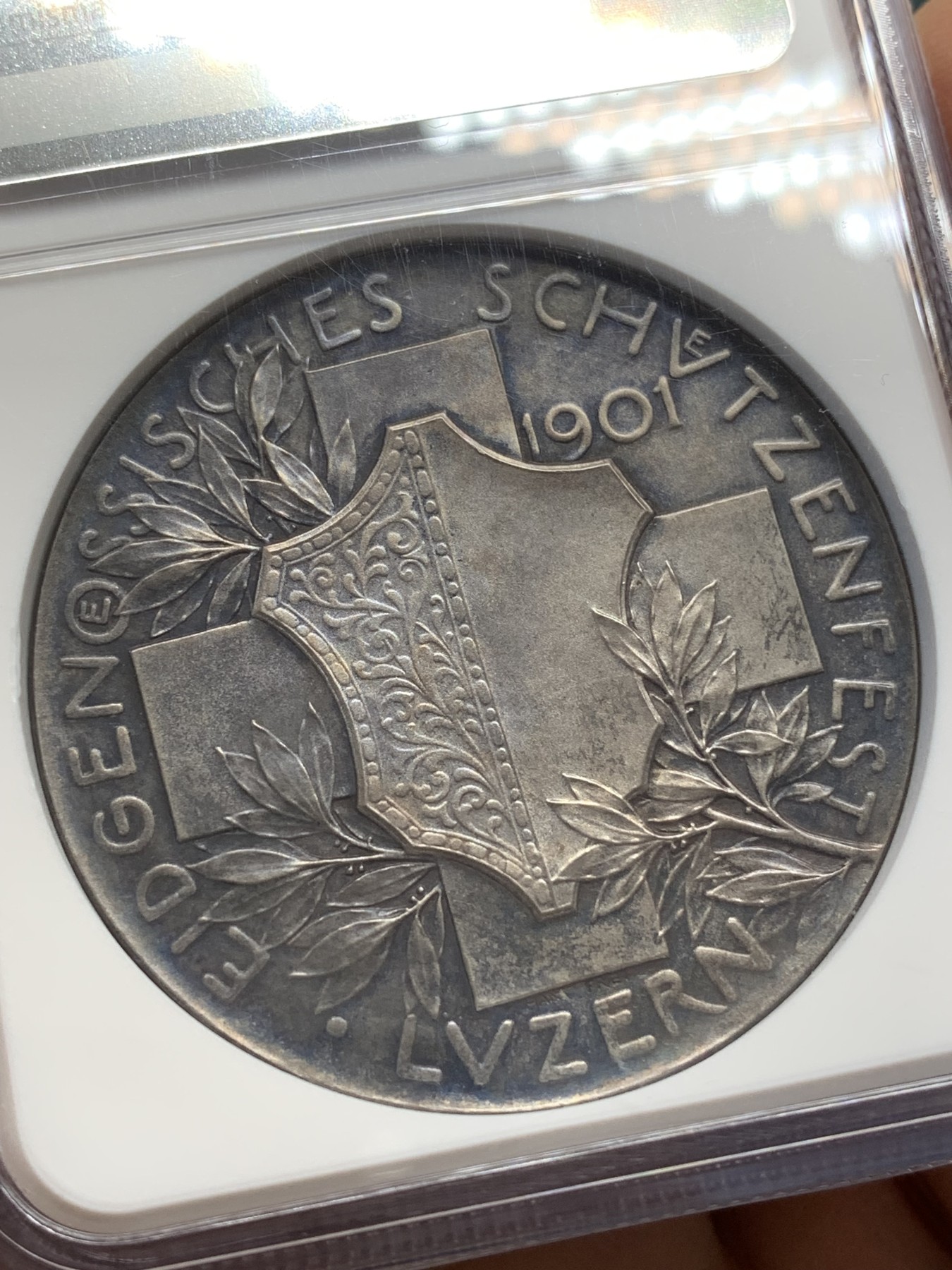 《竞宝斋》第223场-周日，周一 2场 (全场包邮) NGC-MS64 瑞士1901卢赛恩射击节大银章，赫尔维蒂娅女神，经典设计。黑五彩包浆，高分好状态。