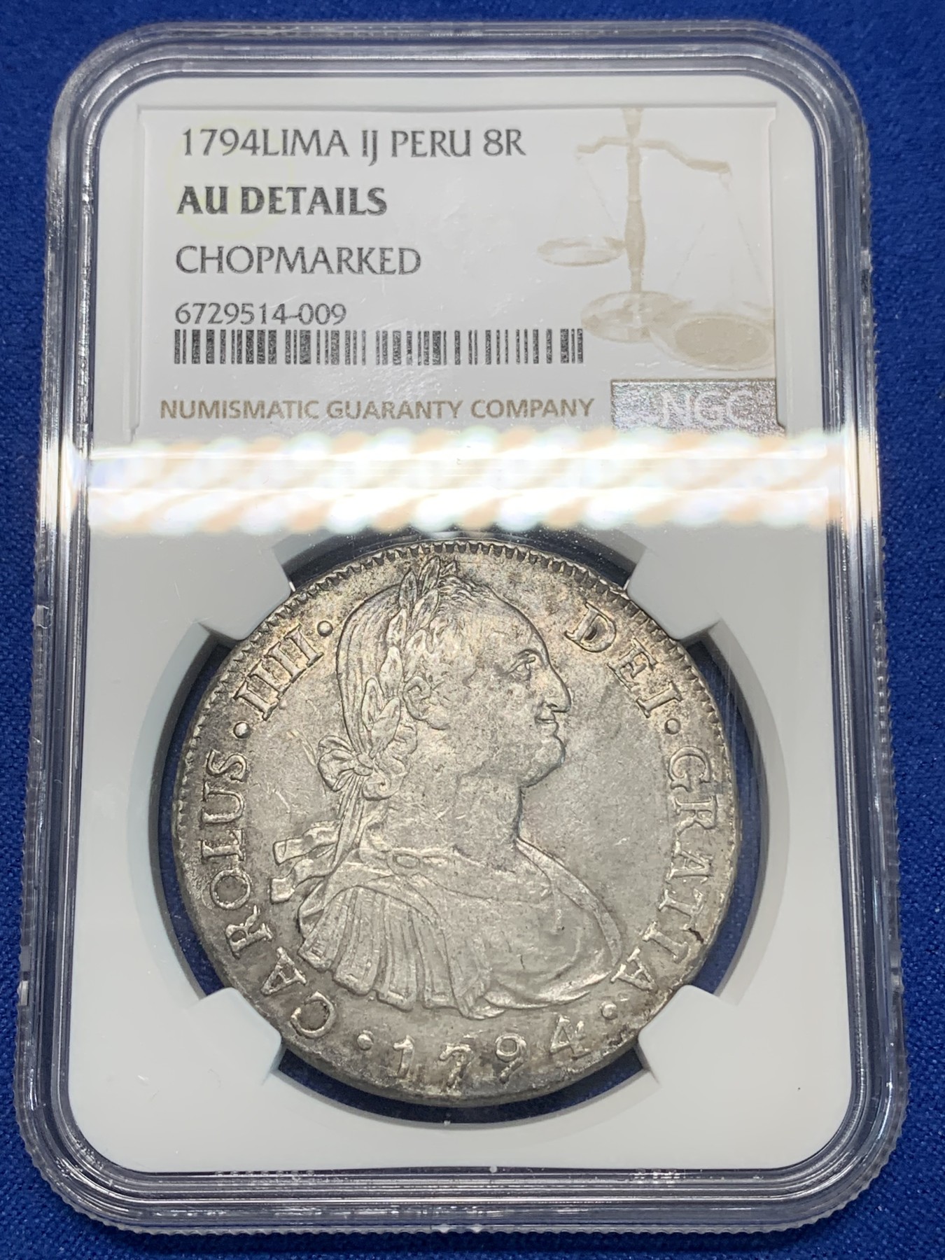 《竞宝斋》第223场-周日，周一 2场 (全场包邮) NGC AUD 西属秘鲁1794年卡洛斯四世双柱8R 小米戳 状态深打