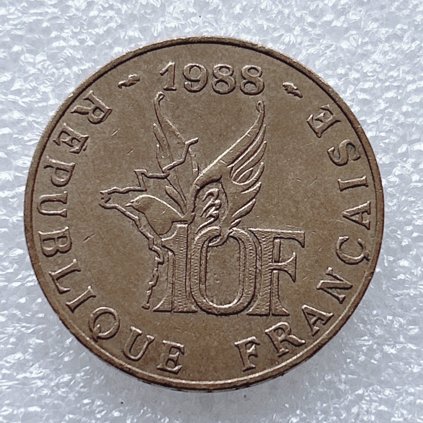 全场一元起拍 世界钱币散币、银币专场 第46期 法国1988年10法朗纪念币(法国一战空军英豪 罗兰.加洛斯)