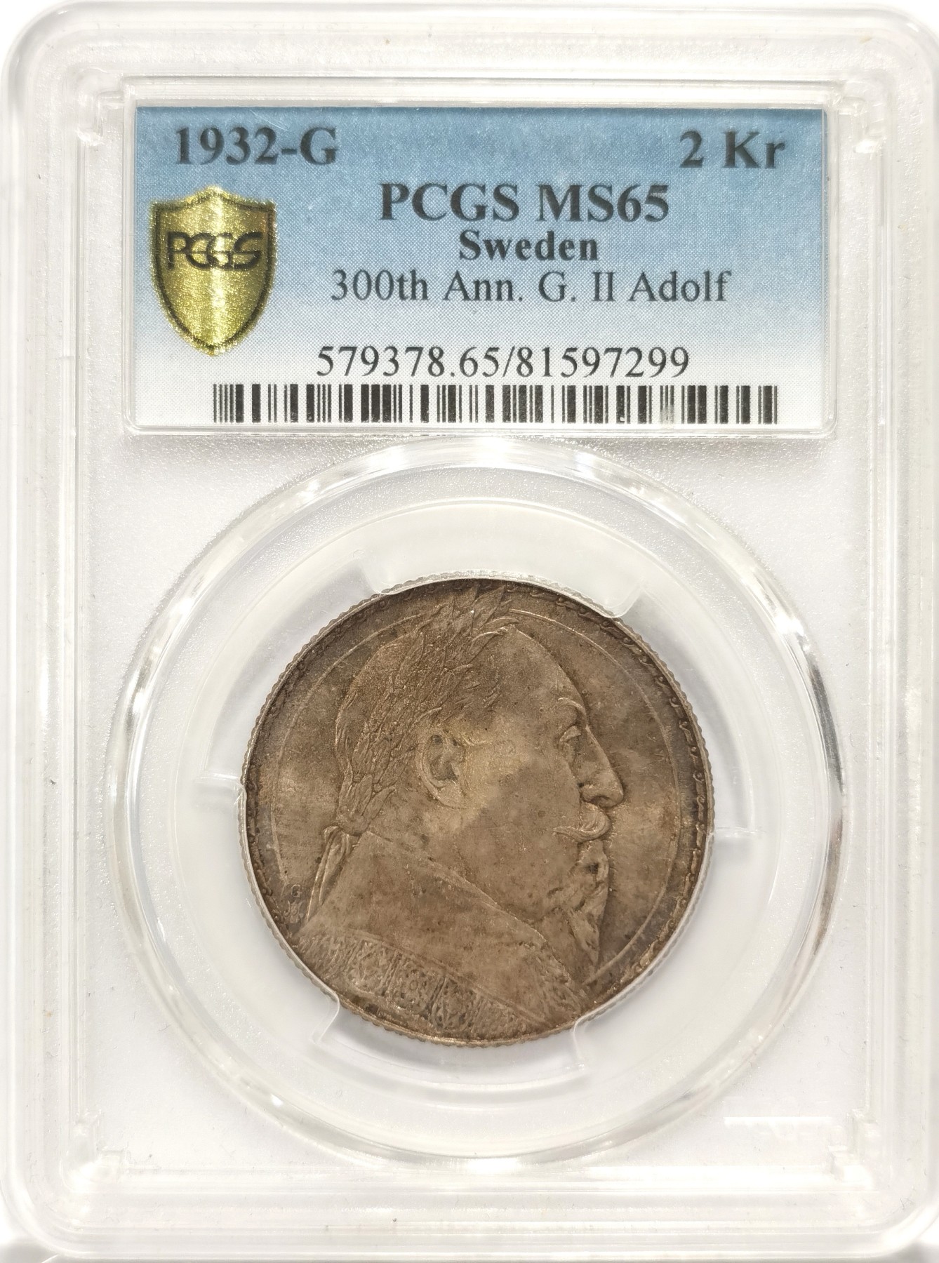 博洋堂世界钱币拍卖第056期（全场包邮） PCGS MS65 瑞典1932年古斯塔夫二世逝世2克朗银币，该品种65及以上分数较少，老包浆能到65更是难得，可以收藏的状态分数