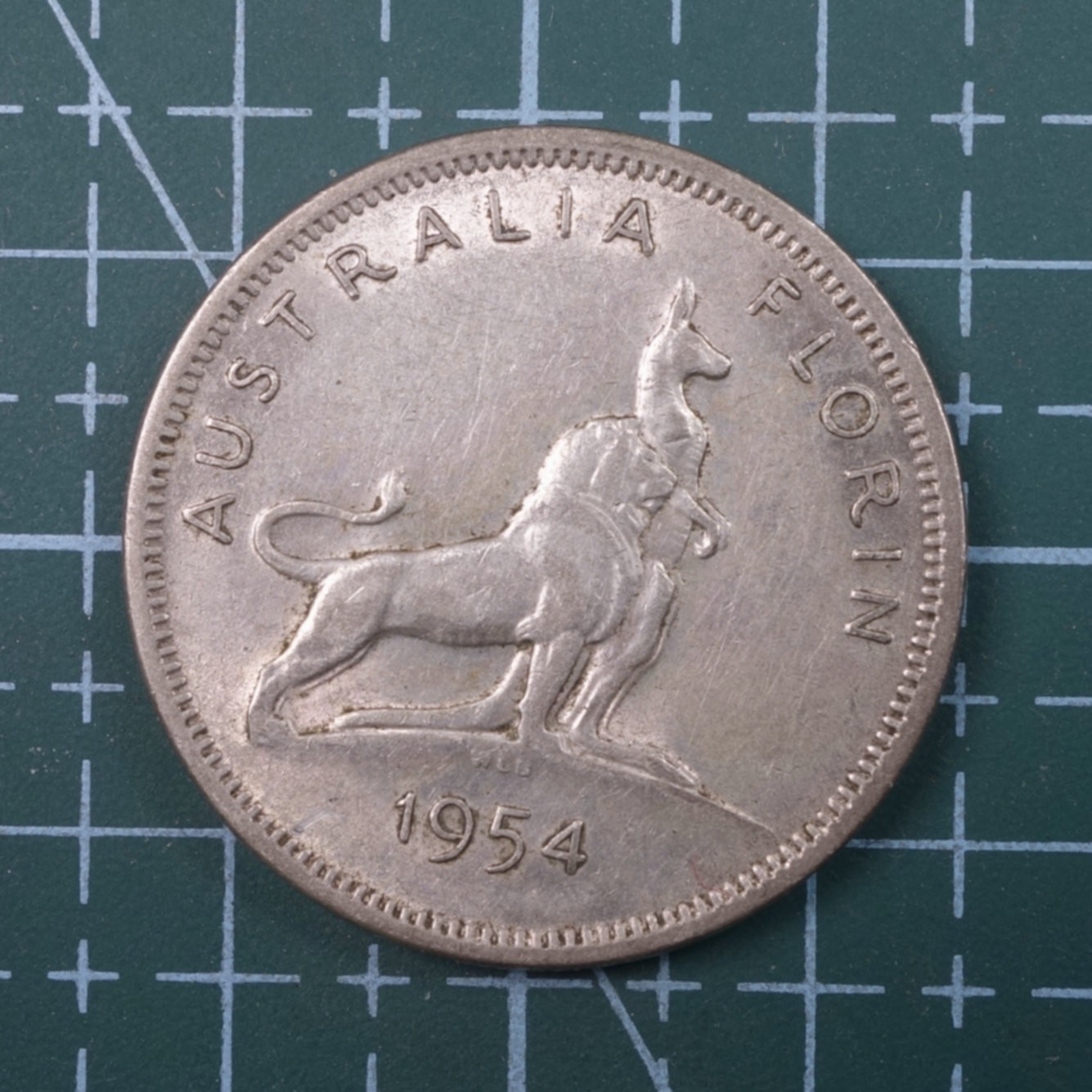 天业钱币散币、银币拍卖第22次专场 全场0元起拍0佣金，欢迎围观参拍 澳大利亚1954年1福林银币（重量：11.31克；含银：0.5）