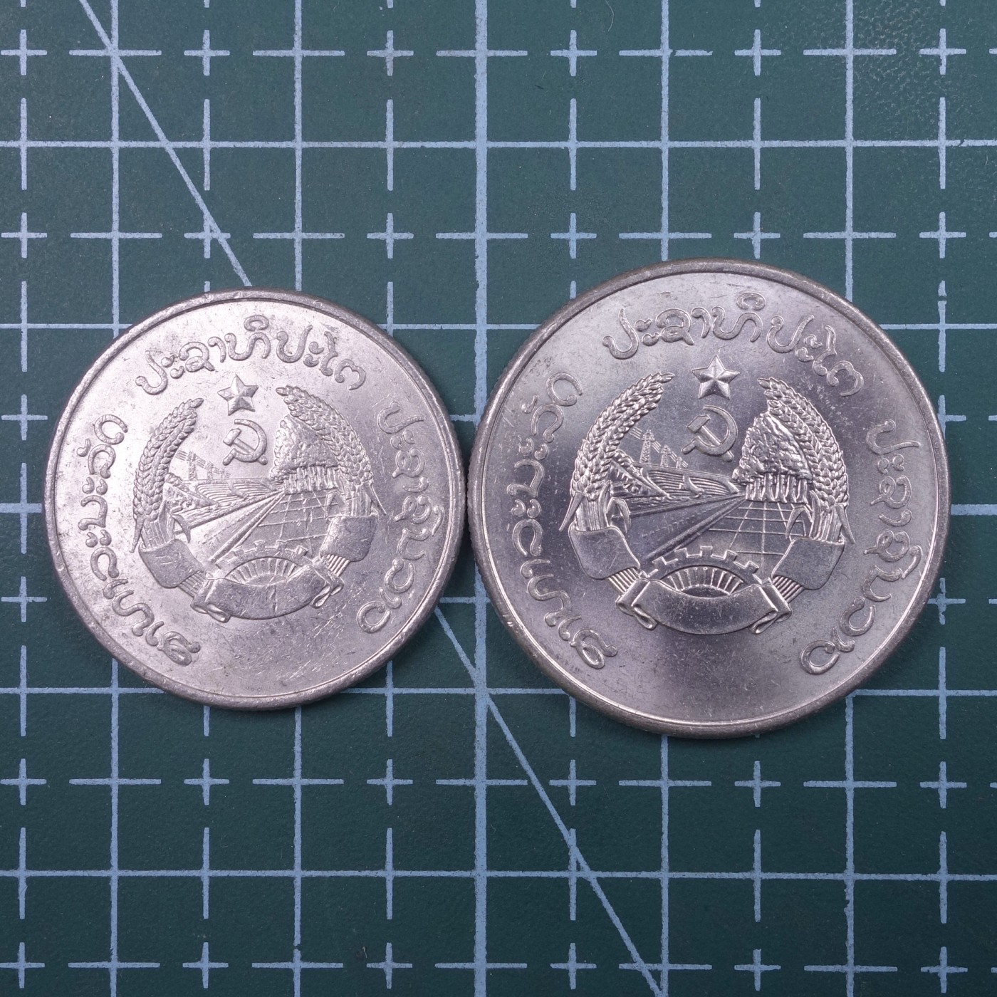 天业钱币散币、银币拍卖第22次专场 全场0元起拍0佣金，欢迎围观参拍 老挝1980年20、50元铝币一对 UNC