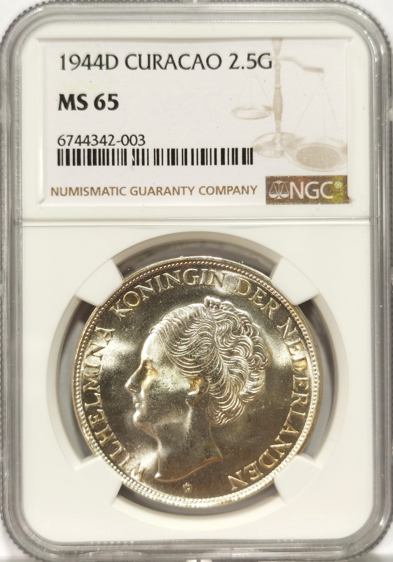 博洋堂世界钱币拍卖第056期（全场包邮） NGC MS65 1944年荷属库拉索女王威廉明娜2.5盾大银币，该品种很难到65，往上66分仅6枚，收藏级分数