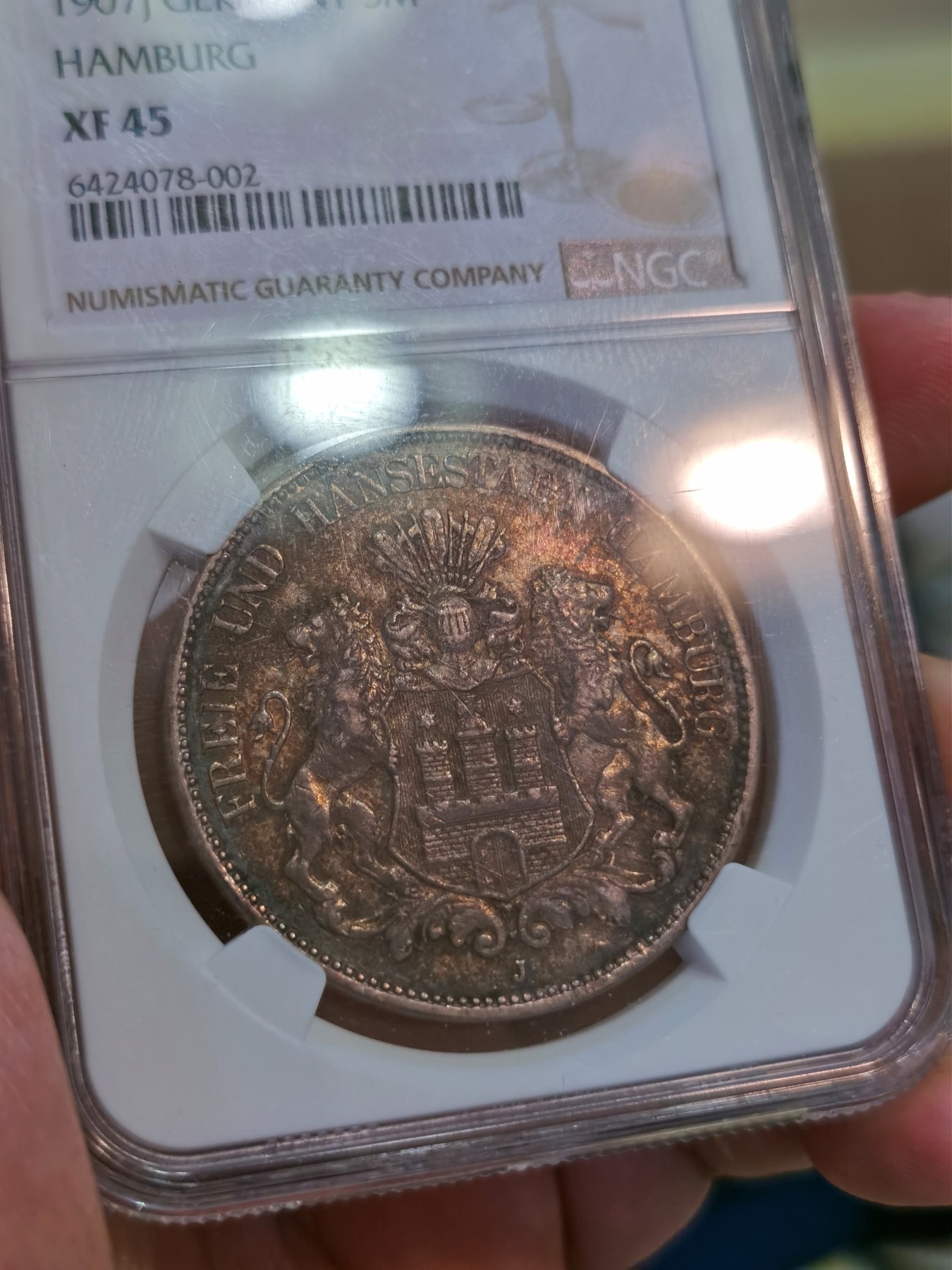 博洋堂世界钱币拍卖第056期（全场包邮） NGC XF45 1907年汉堡5马克，特年，往上仅5枚更高，MS中仅一枚61分最高。明显低评的一枚，状态细节不输58分。正反都是非常耀眼的黑色重五彩包浆，视觉效果极佳