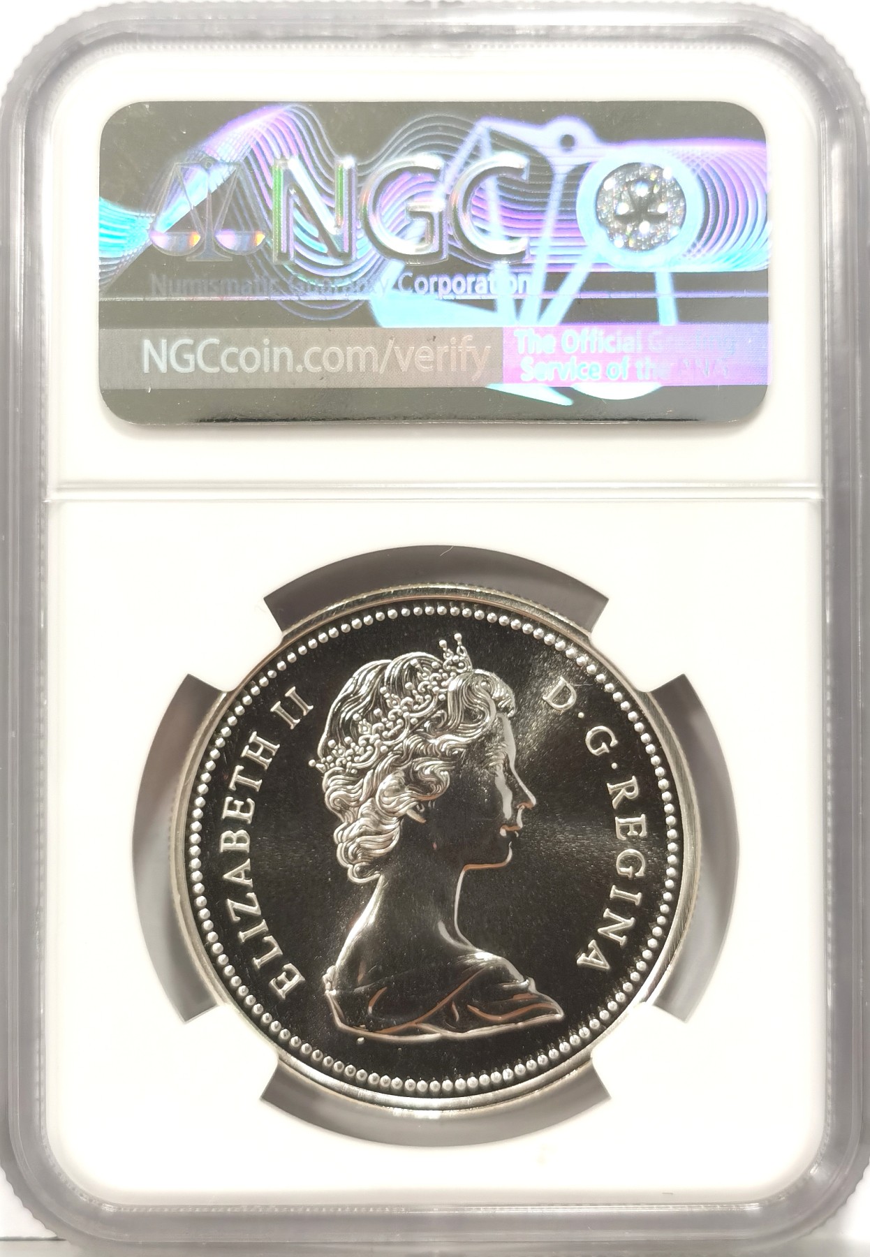 博洋堂世界钱币拍卖第056期（全场包邮） 加拿大1976年国会图书馆1元纪念银币NGC-SP69，直径36mm，重23.32克。 类似镜面状态，币面清爽干净又漂亮，打制精美，银光闪闪，状态一流，顶级高分，更高评级数量才区区2枚