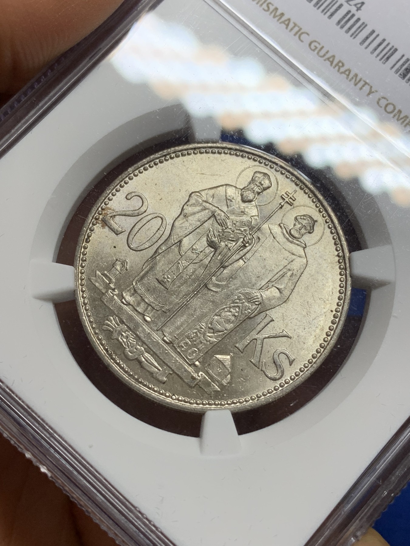 《竞宝斋》第224场-周日，周一，周二 3场 (全场包邮) NGC-MS63 1941年斯洛伐克双主教20克朗银币，带银光车轮转光，品相不错