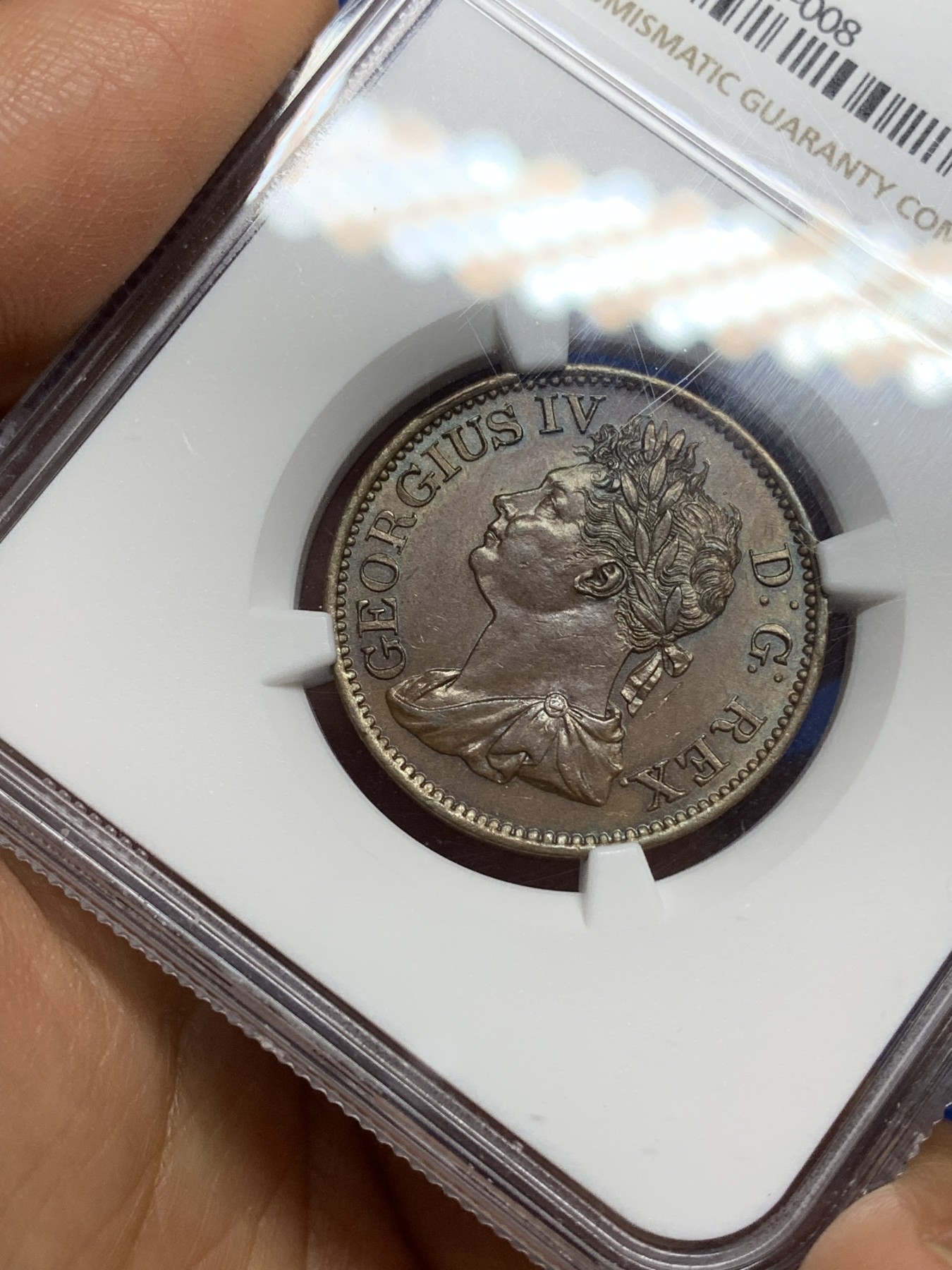 《竞宝斋》第224场-周日，周一，周二 3场 (全场包邮) NGC MS64 BN 爱尔兰 1823 乔四 半便士铜币 巧克力包浆 细节近乎完美 难得状态 通常能见到都是VF级的状态 这枚不可错过