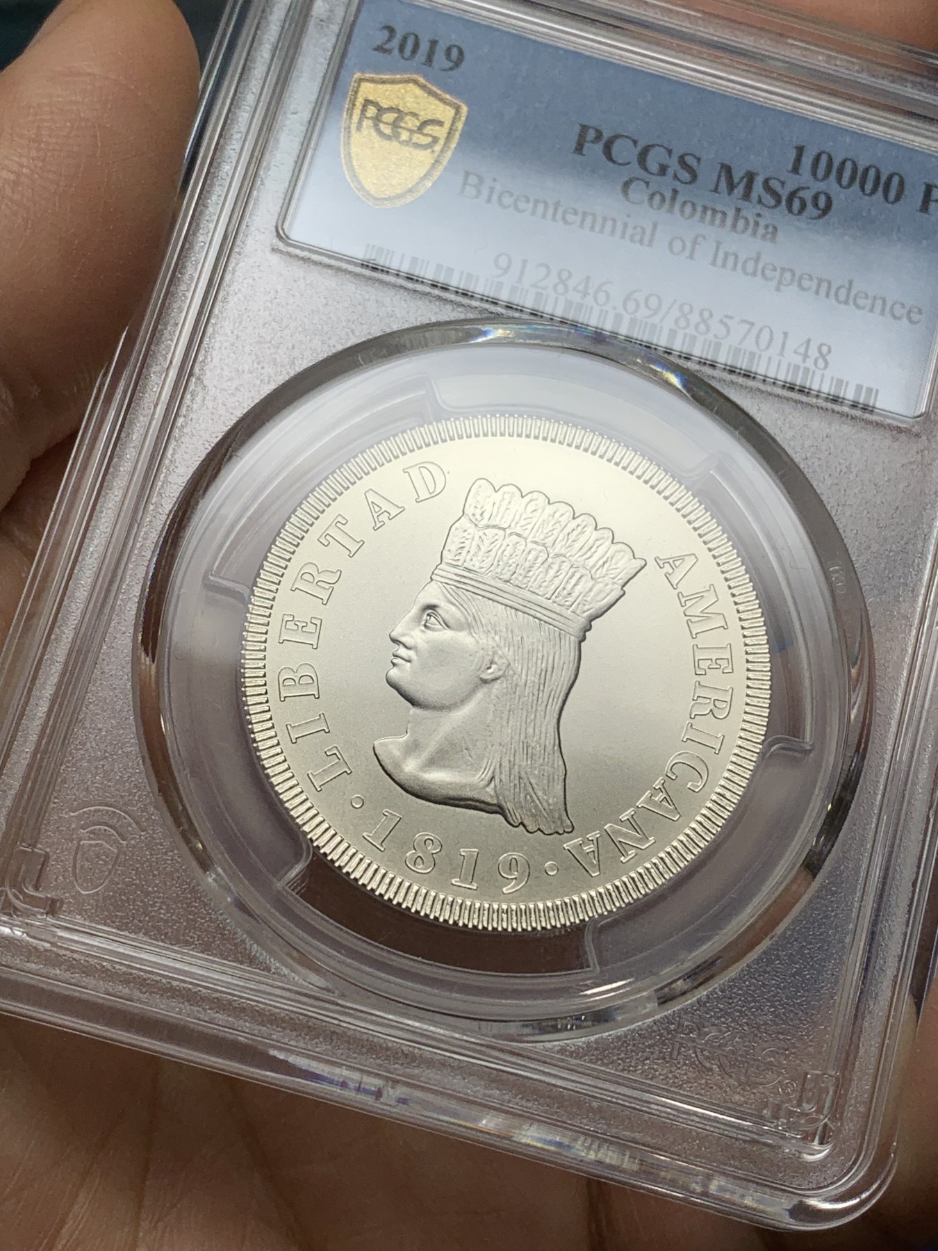 《竞宝斋》第224场-周日，周一，周二 3场 (全场包邮) PCGS金盾 MS69 哥伦比亚2019年独立二百周年纪念仿古1万比索镍币