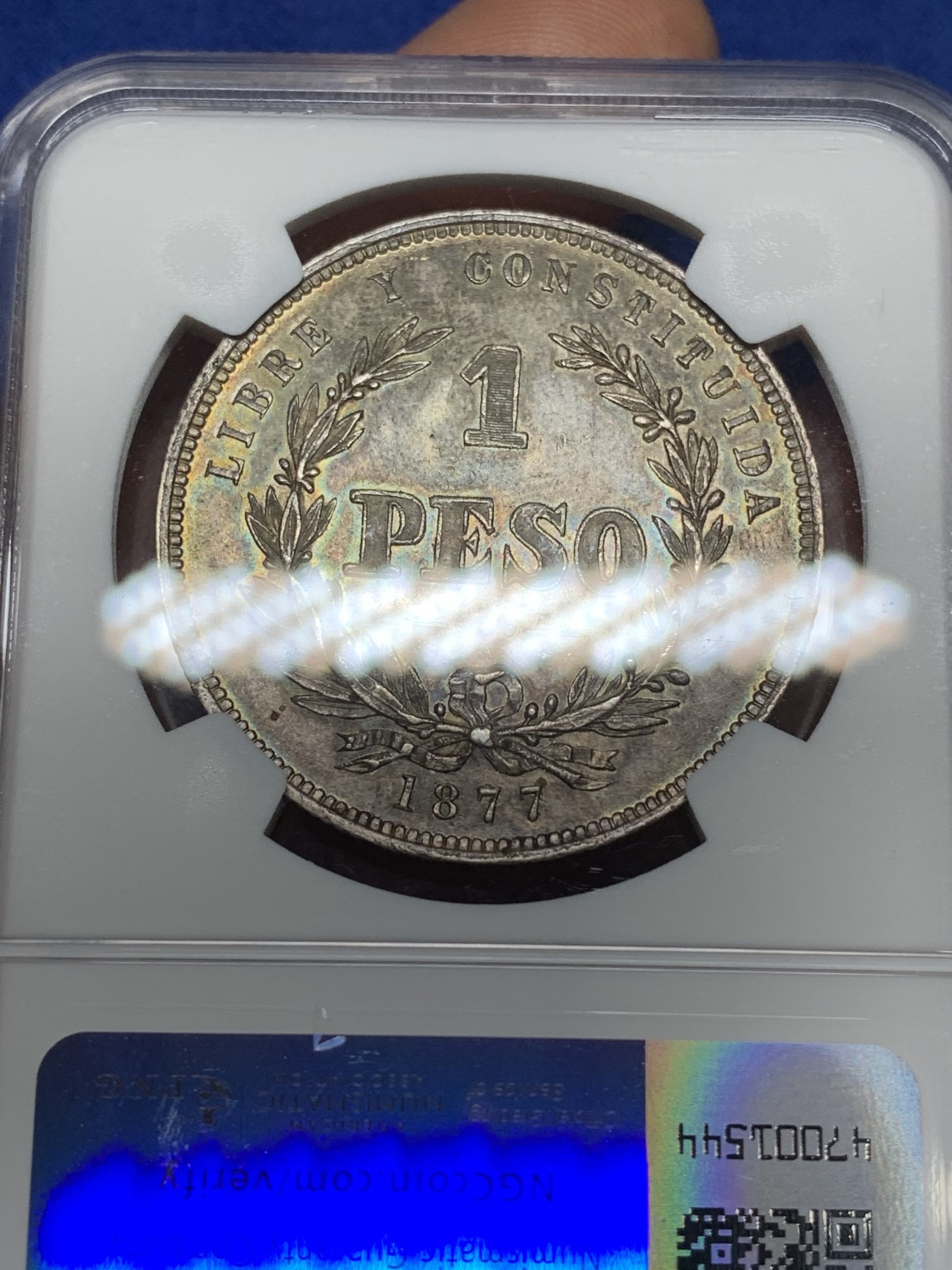 《竞宝斋》第224场-周日，周一，周二 3场 (全场包邮) NGC MS63 乌拉圭 1877年 国徽1比索 大银币 乌拉圭地缘所限 早期上MS的极少，XF的裸币成交价在1000左右，上升品种