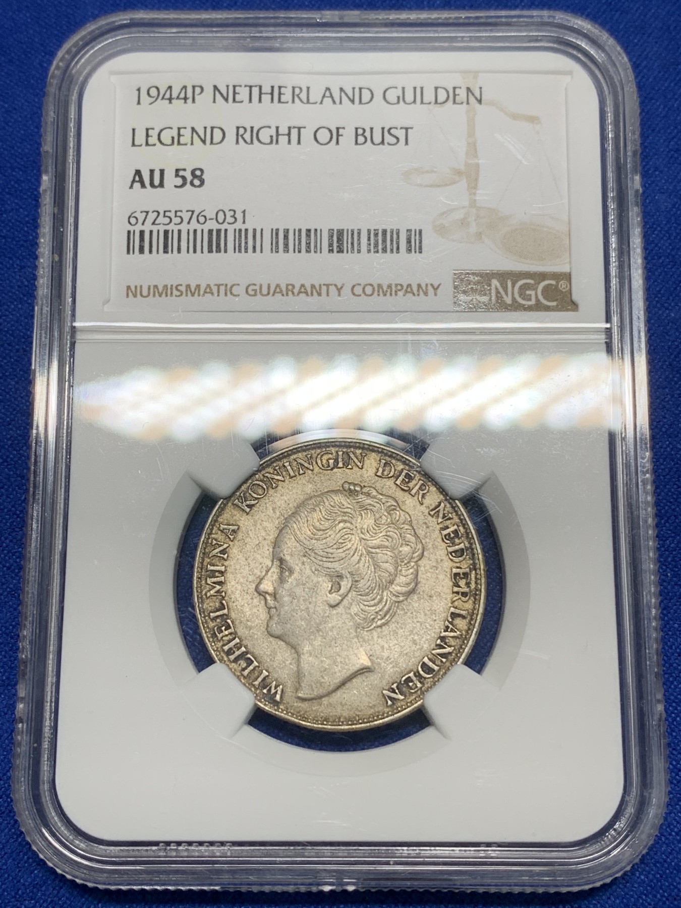 《竞宝斋》第224场-周日，周一，周二 3场 (全场包邮) NGC-AU58 荷兰流亡政府1944年威廉明娜女王1盾银币P版，不是普通的1盾。温润老包浆，58里的顶级状态