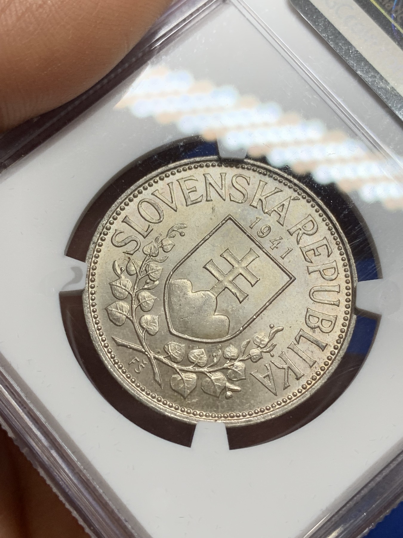 《竞宝斋》第224场-周日，周一，周二 3场 (全场包邮) NGC-MS63 1941年斯洛伐克双主教20克朗银币，带银光车轮转光，品相不错