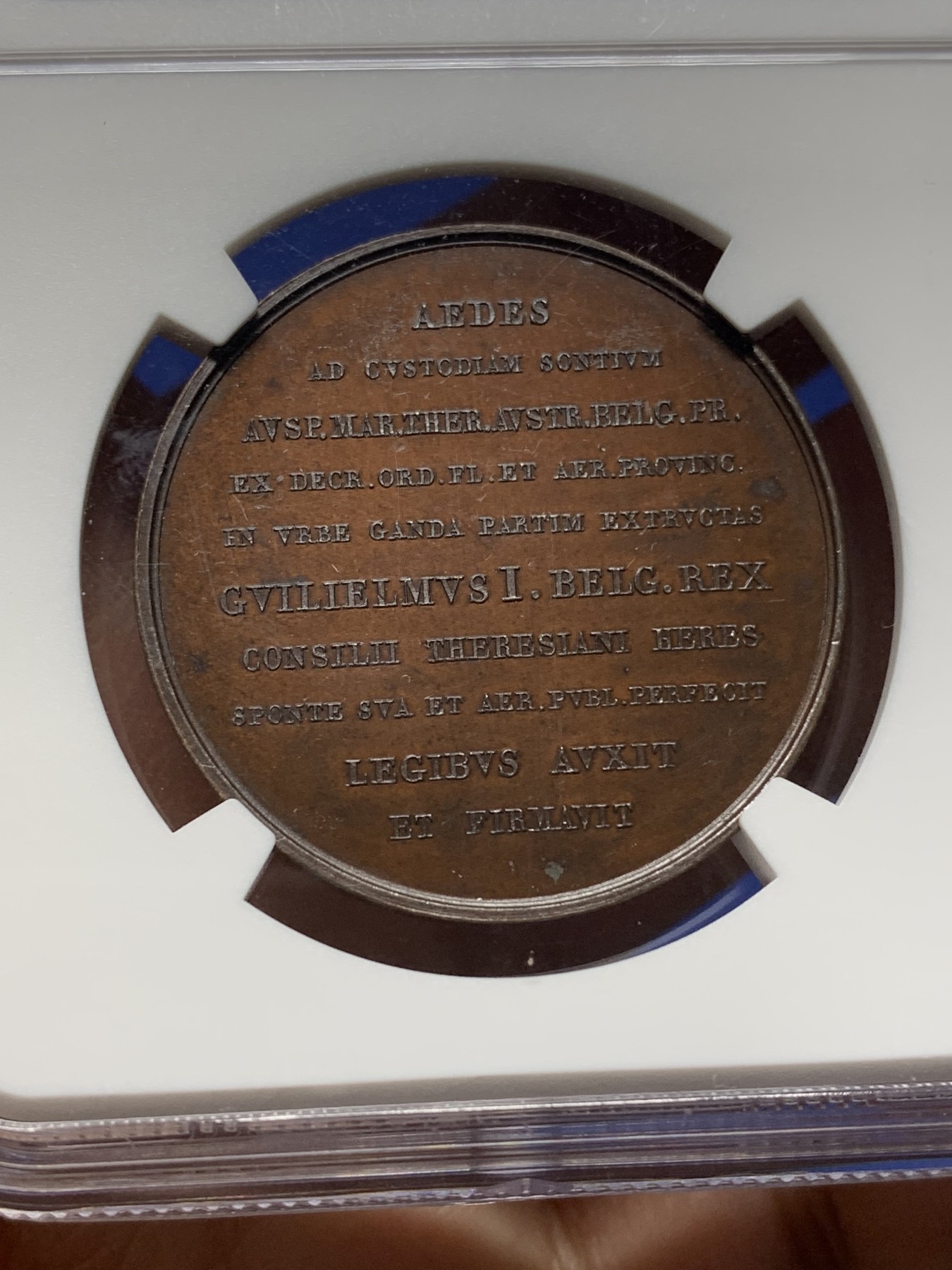 《竞宝斋》第225场-周日，周一，周二 3场 (全场包邮) NGC MS66 荷兰1826年铜章，根特监狱，细节丰富，顶级分数，紫色镜面光泽，附NGC高清大图。