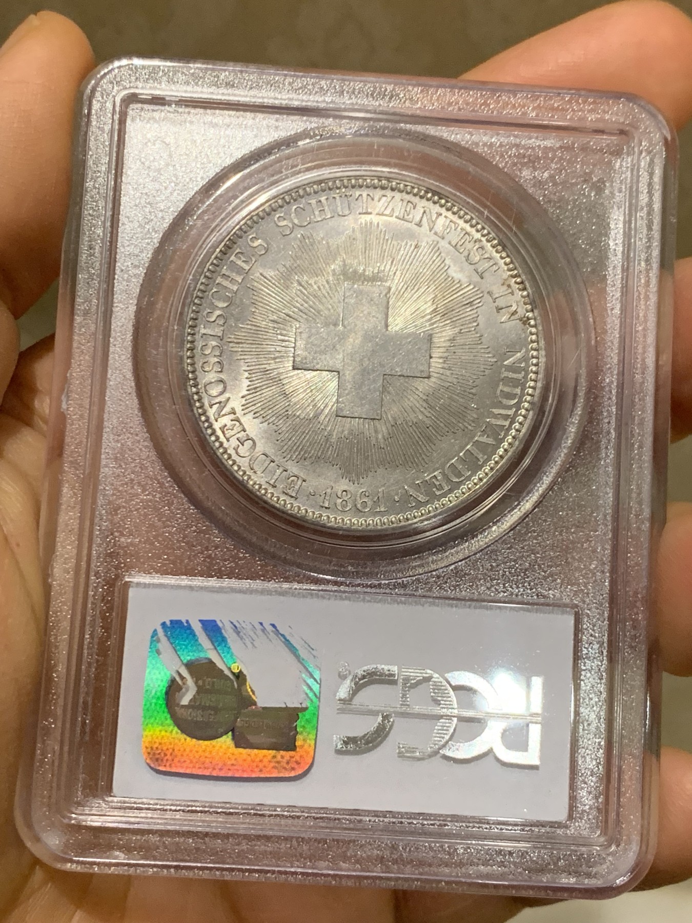 《竞宝斋》第225场-周日，周一，周二 3场 (全场包邮) PCGS MS62 1861年瑞士尼瓦尔登射击节5法郎，发行量仅6000枚，高点俱在，底板佳，老白盒严评，老藏家旧藏，这枚射击节法郎品种上MS非常难得