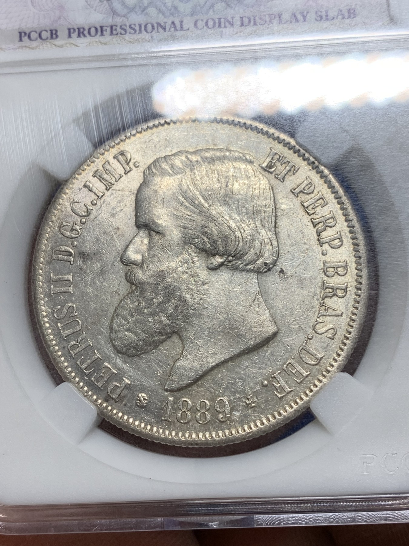 《竞宝斋》第225场-周日，周一，周二 3场 (全场包邮) 巴西1889年佩德罗二世2000瑞斯大银币。