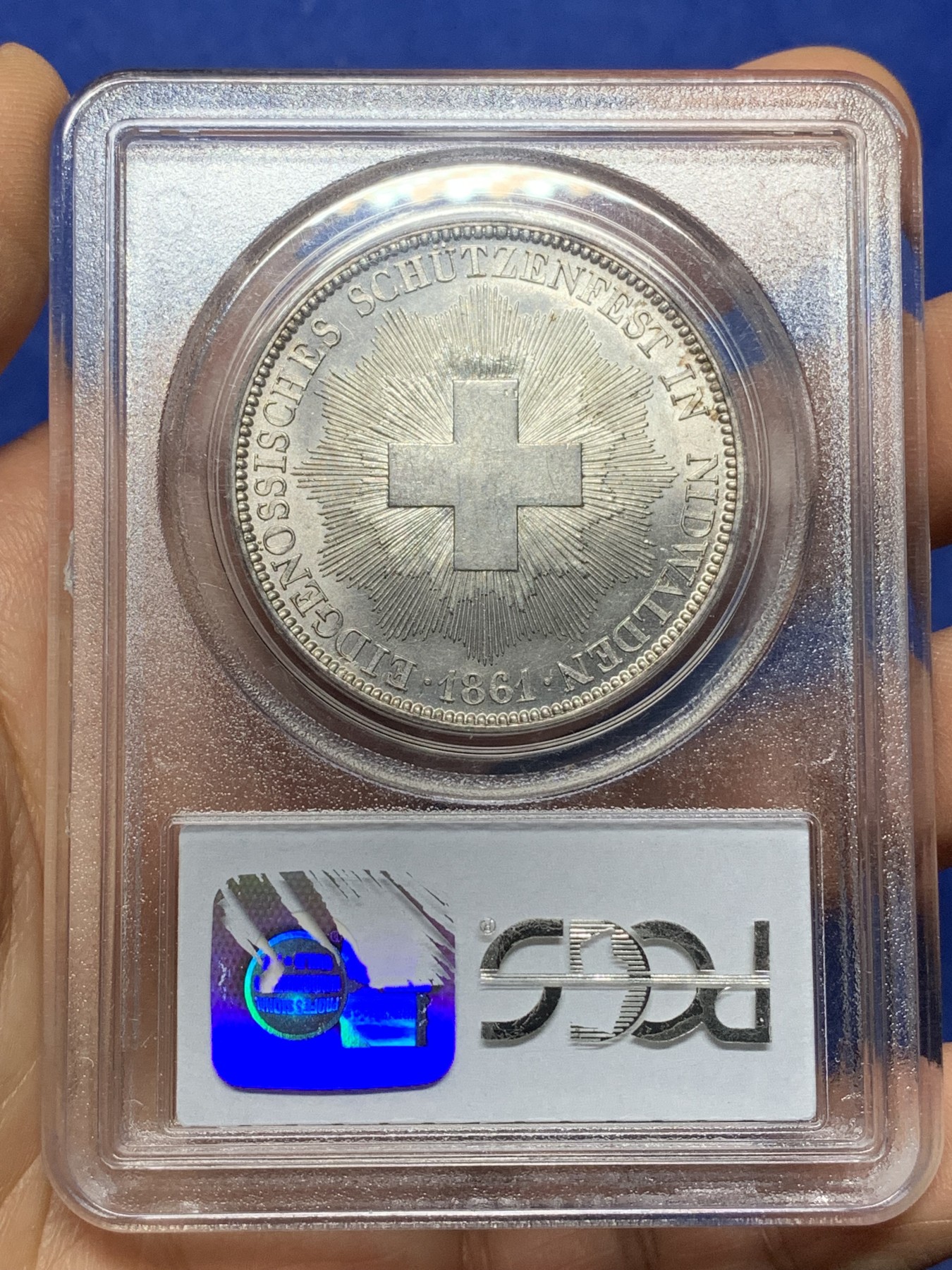 《竞宝斋》第225场-周日，周一，周二 3场 (全场包邮) PCGS MS62 1861年瑞士尼瓦尔登射击节5法郎，发行量仅6000枚，高点俱在，底板佳，老白盒严评，老藏家旧藏，这枚射击节法郎品种上MS非常难得