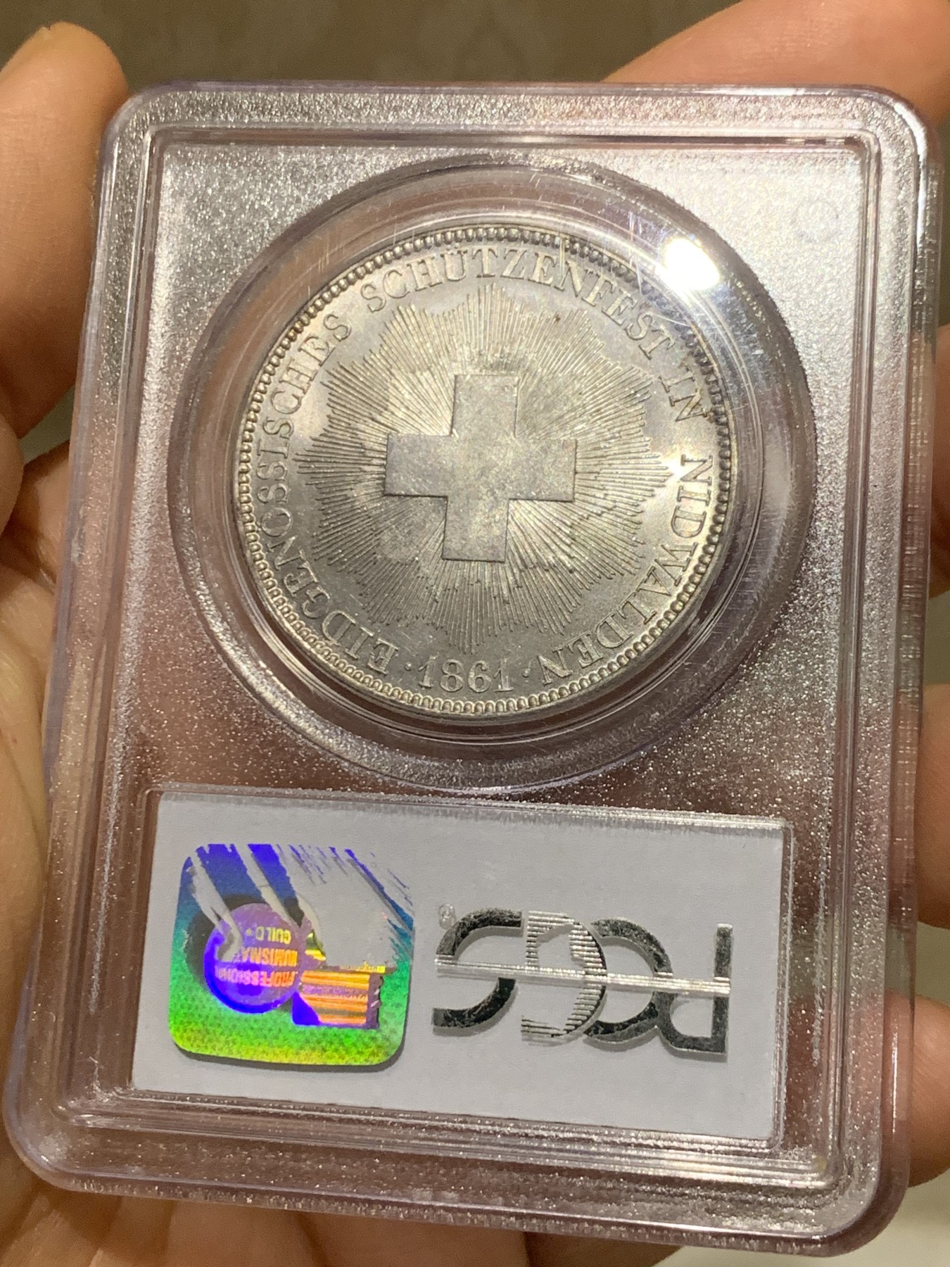 《竞宝斋》第225场-周日，周一，周二 3场 (全场包邮) PCGS MS62 1861年瑞士尼瓦尔登射击节5法郎，发行量仅6000枚，高点俱在，底板佳，老白盒严评，老藏家旧藏，这枚射击节法郎品种上MS非常难得