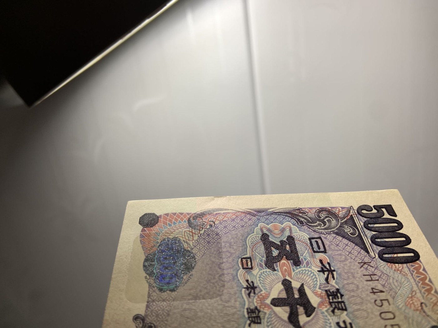 收藏联盟Quantum Auction 第312期拍卖  日本ND (2014)年5000日元 品相UNC- 票面有捆印和边角瑕疵 作家樋口一叶 明年换版