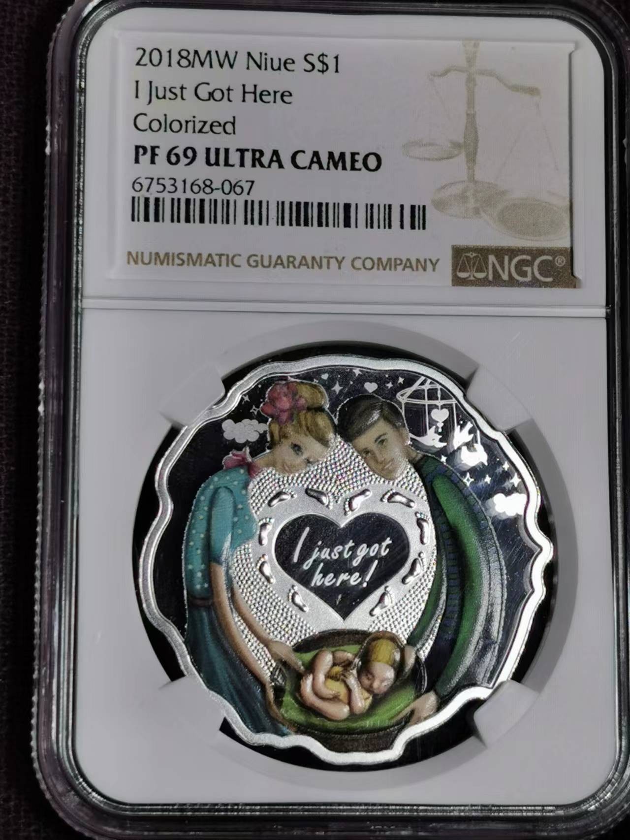 刘世昌艺术品销售中心～虎踞龙蟠*金杨在线联拍群第508期  纽埃2018年“宝宝出生”彩色精制纪念银币（NGC PF69UC 串号：6753168-067）1枚， 原盒证。 发行量：999枚。