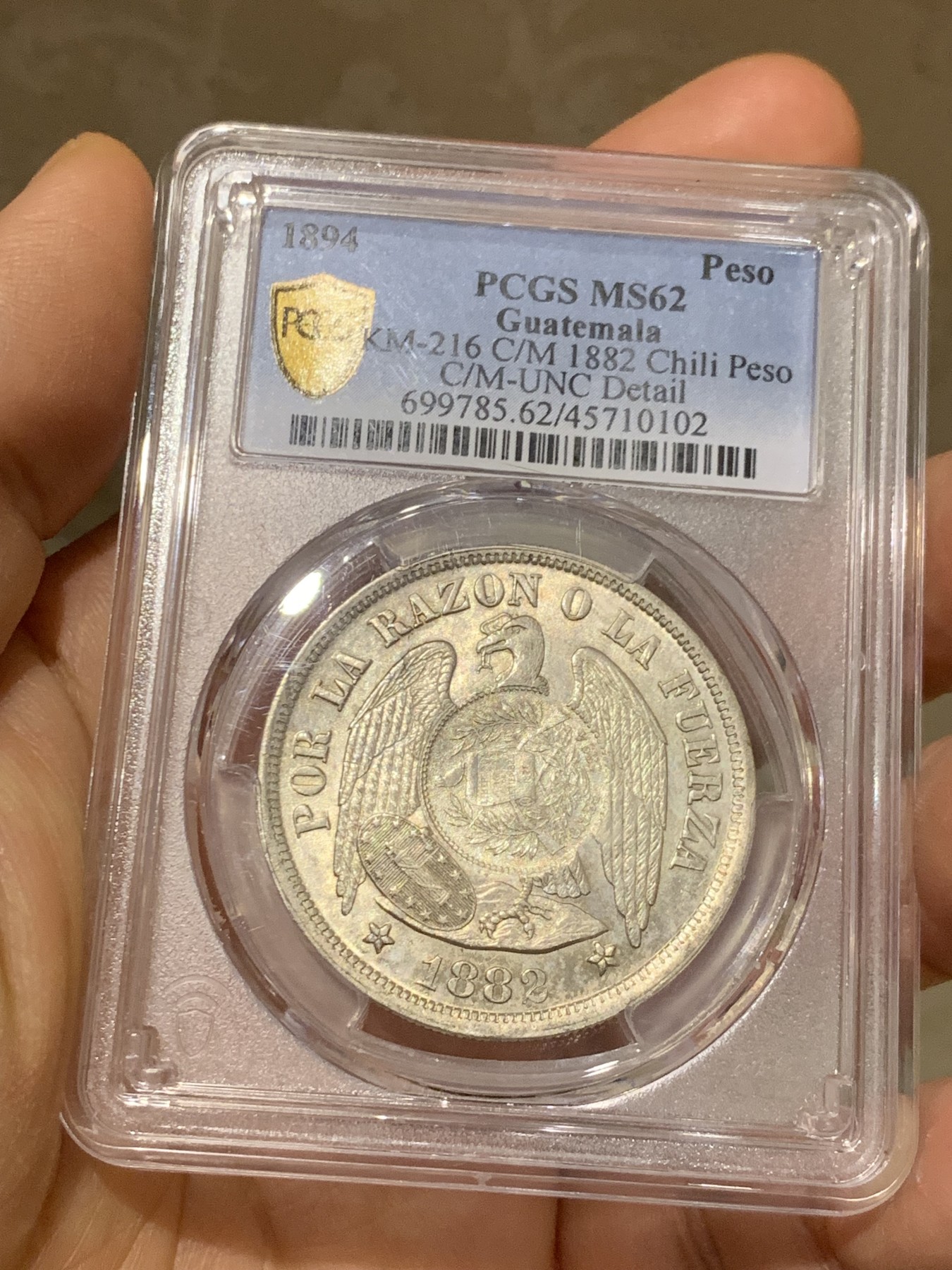 《竞宝斋》第225场-周日，周一，周二 3场 (全场包邮) 冠军分 PCGS-MS62 危地马拉 1894年 加盖 智利比索 热门加盖品种 多为清洗 MS有分较少 光度也非常好 加盖秘鲁常见，智利的少之又少