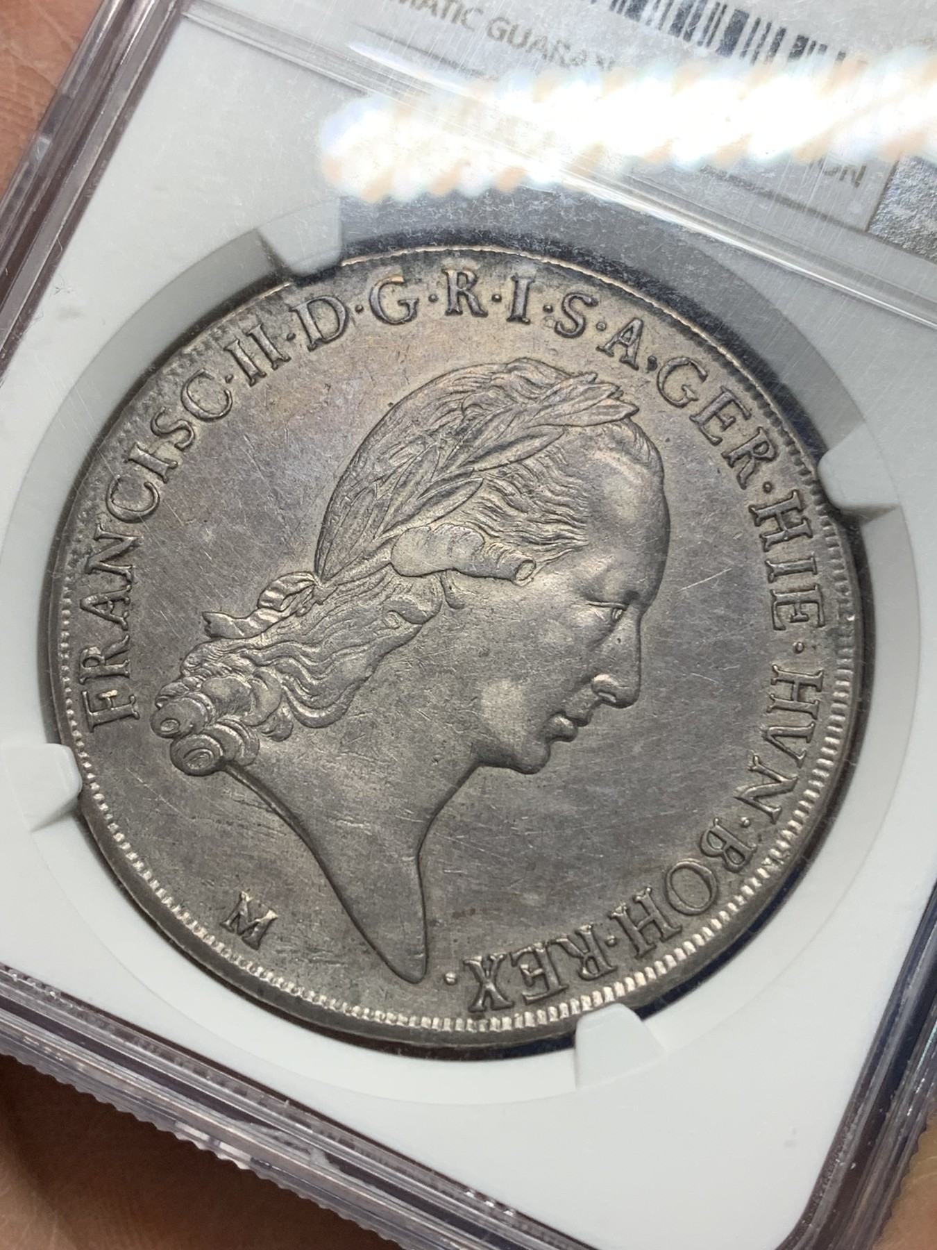 《竞宝斋》第225场-周日，周一，周二 3场 (全场包邮) NGC AUD 弗朗茨二世，米兰版，脸部丰满，比后期发型的要好看很多。拿破仑称帝前米兰臣服于哈布斯堡，故发型银币正面人物采用弗朗茨二世。虽无分，但值得收藏！