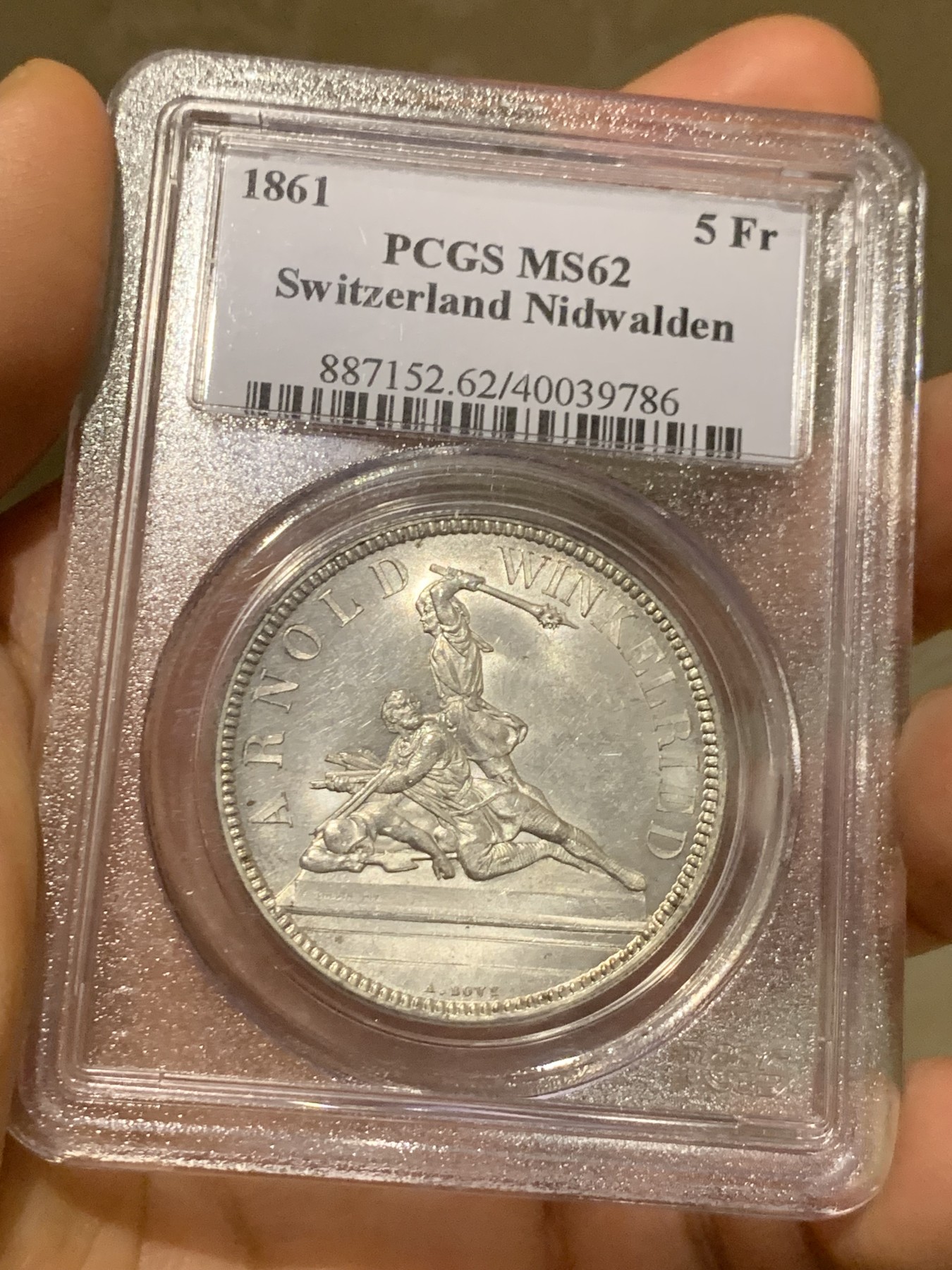 《竞宝斋》第225场-周日，周一，周二 3场 (全场包邮) PCGS MS62 1861年瑞士尼瓦尔登射击节5法郎，发行量仅6000枚，高点俱在，底板佳，老白盒严评，老藏家旧藏，这枚射击节法郎品种上MS非常难得