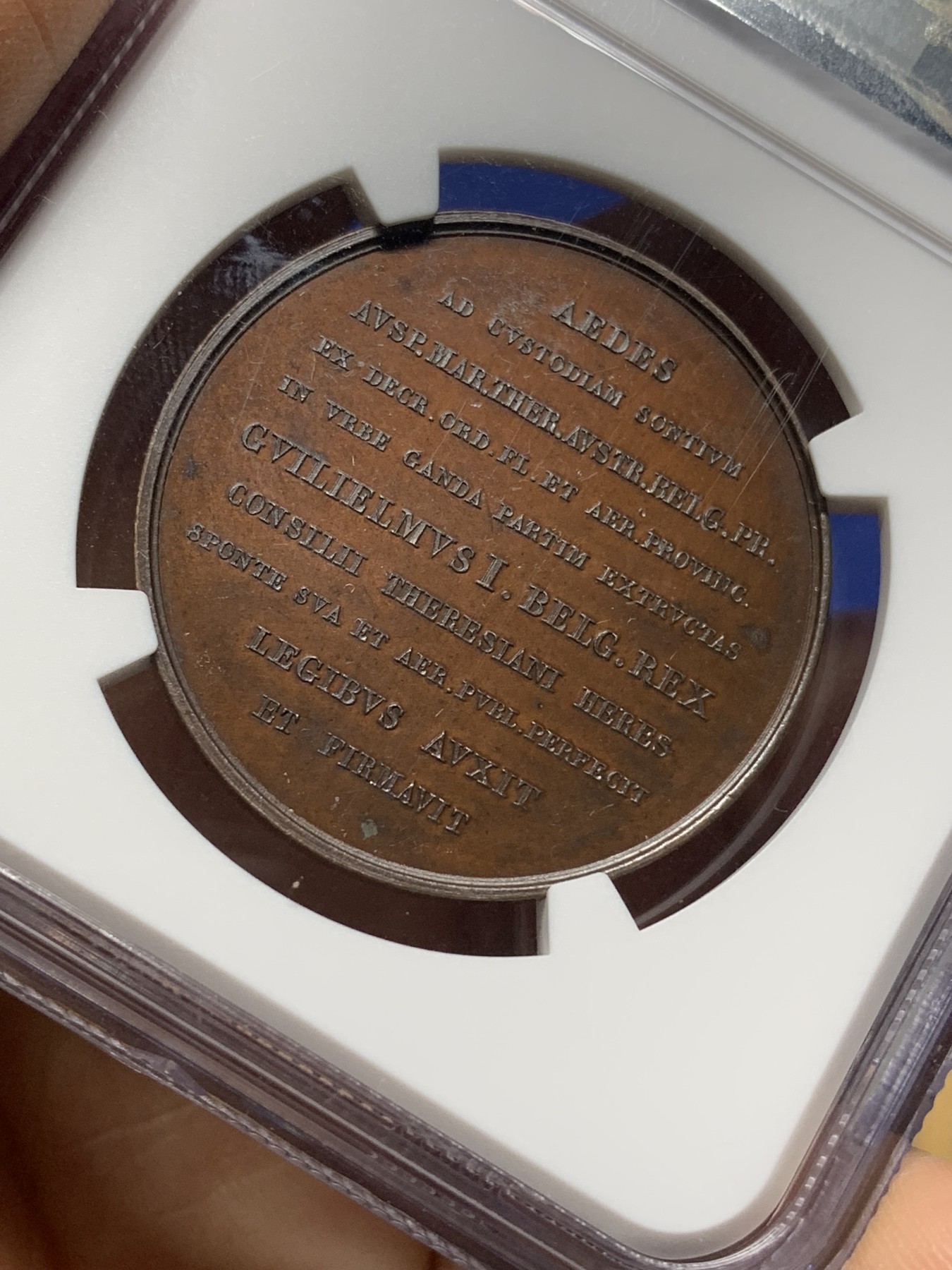 《竞宝斋》第225场-周日，周一，周二 3场 (全场包邮) NGC MS66 荷兰1826年铜章，根特监狱，细节丰富，顶级分数，紫色镜面光泽，附NGC高清大图。